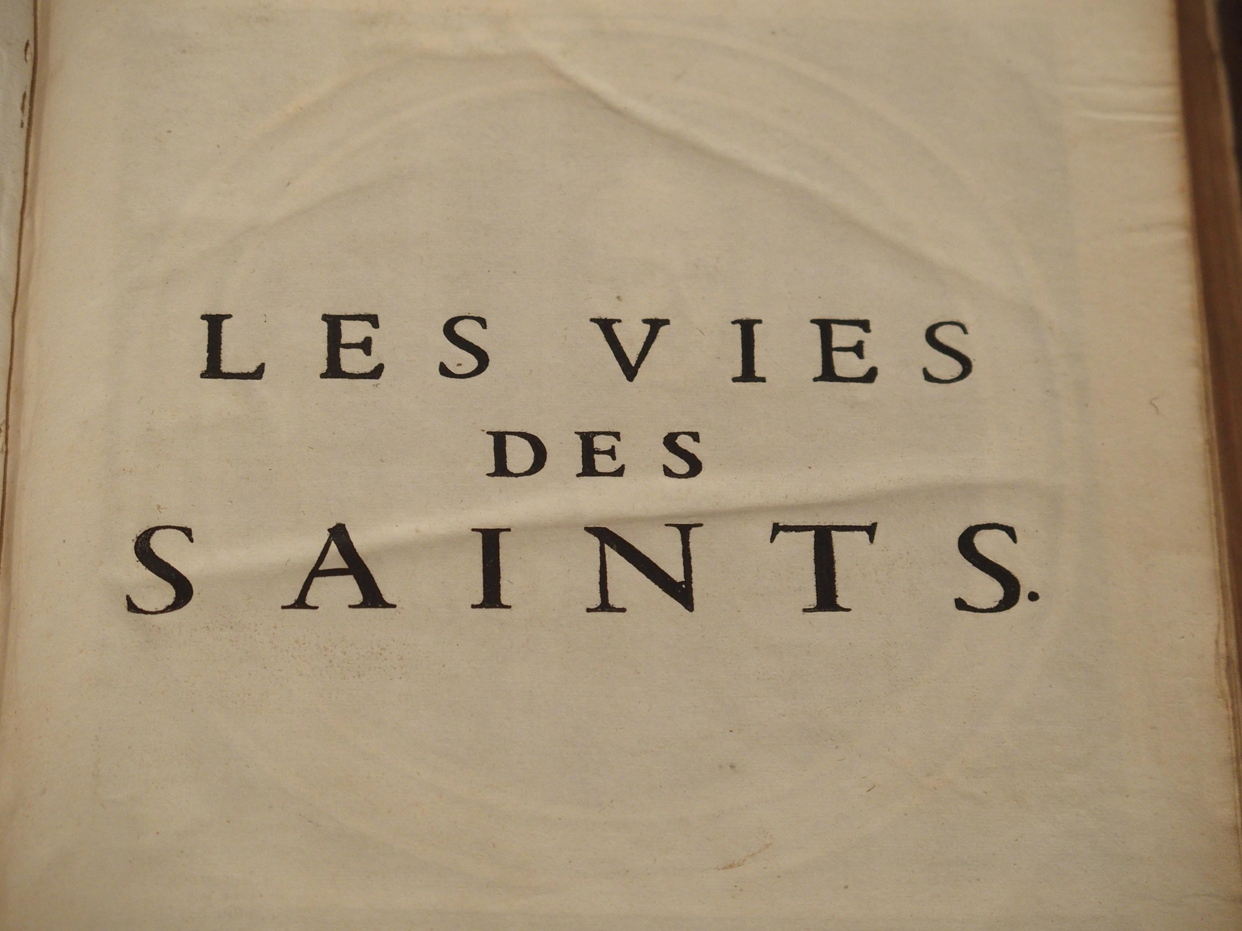 Set of 18th Century French Leather Bound Books, Les Vies Des Saints, 1715 In Good Condition In Dallas, TX