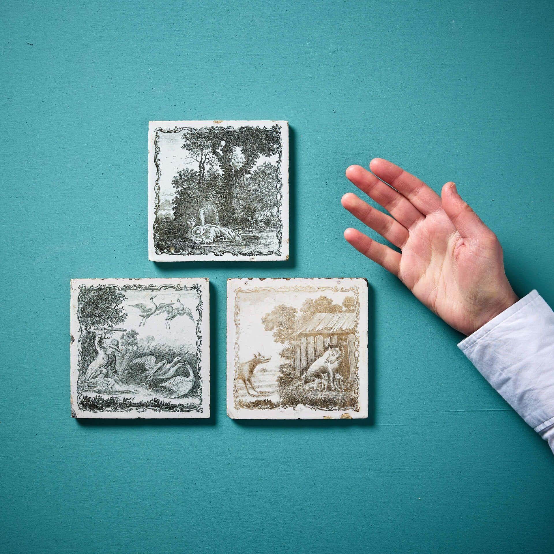 A set of three mid-18th century Delft style tiles by Sadler & Green of Liverpool dating from circa 1765.
 
Ex. private British collection, these decorative antique tiles are each transfer printed with scenes from three of Aesop’s Fables, including