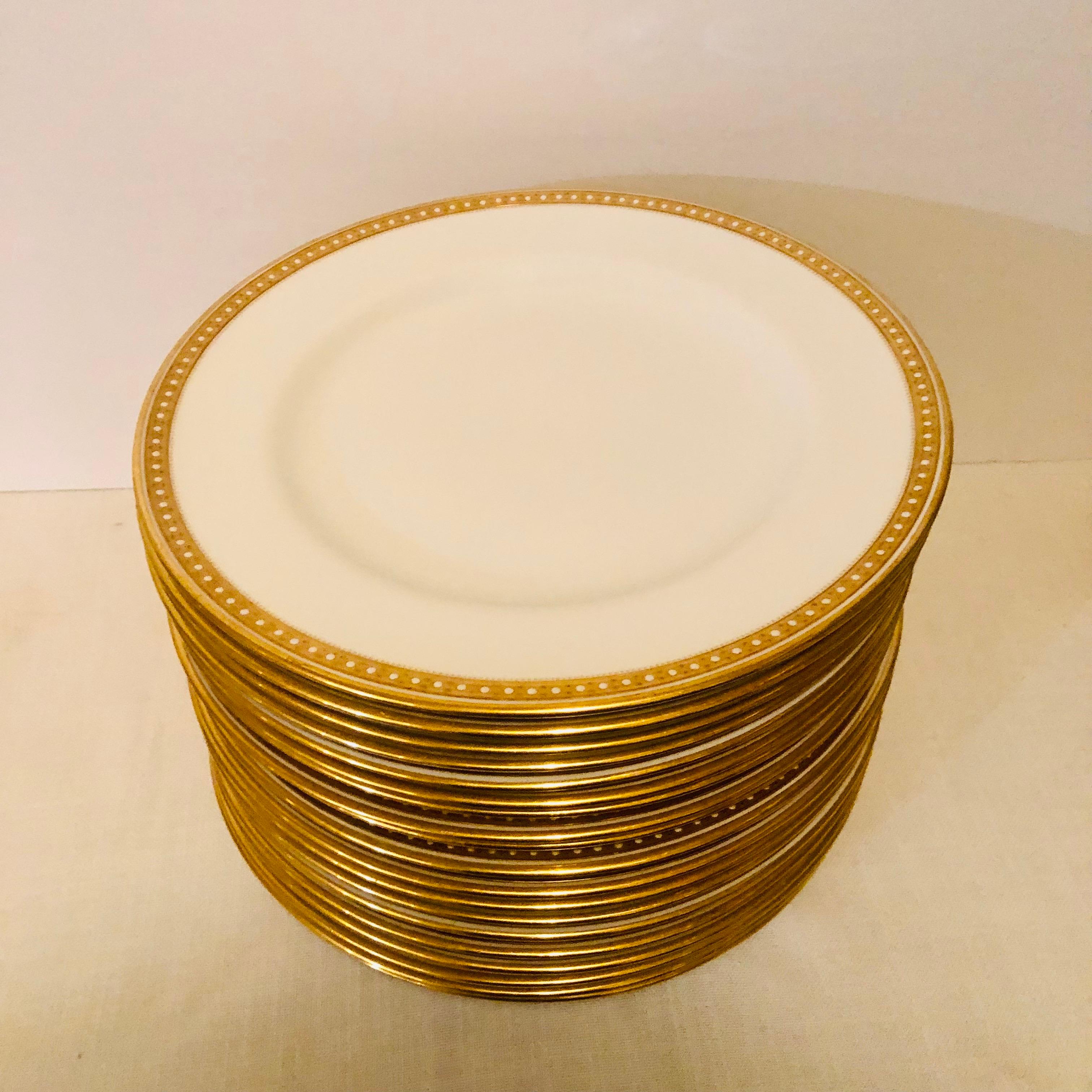 Neoclassical Set of 19 Copeland Spode Dinner Plates With Gold Borders and White Jeweling 