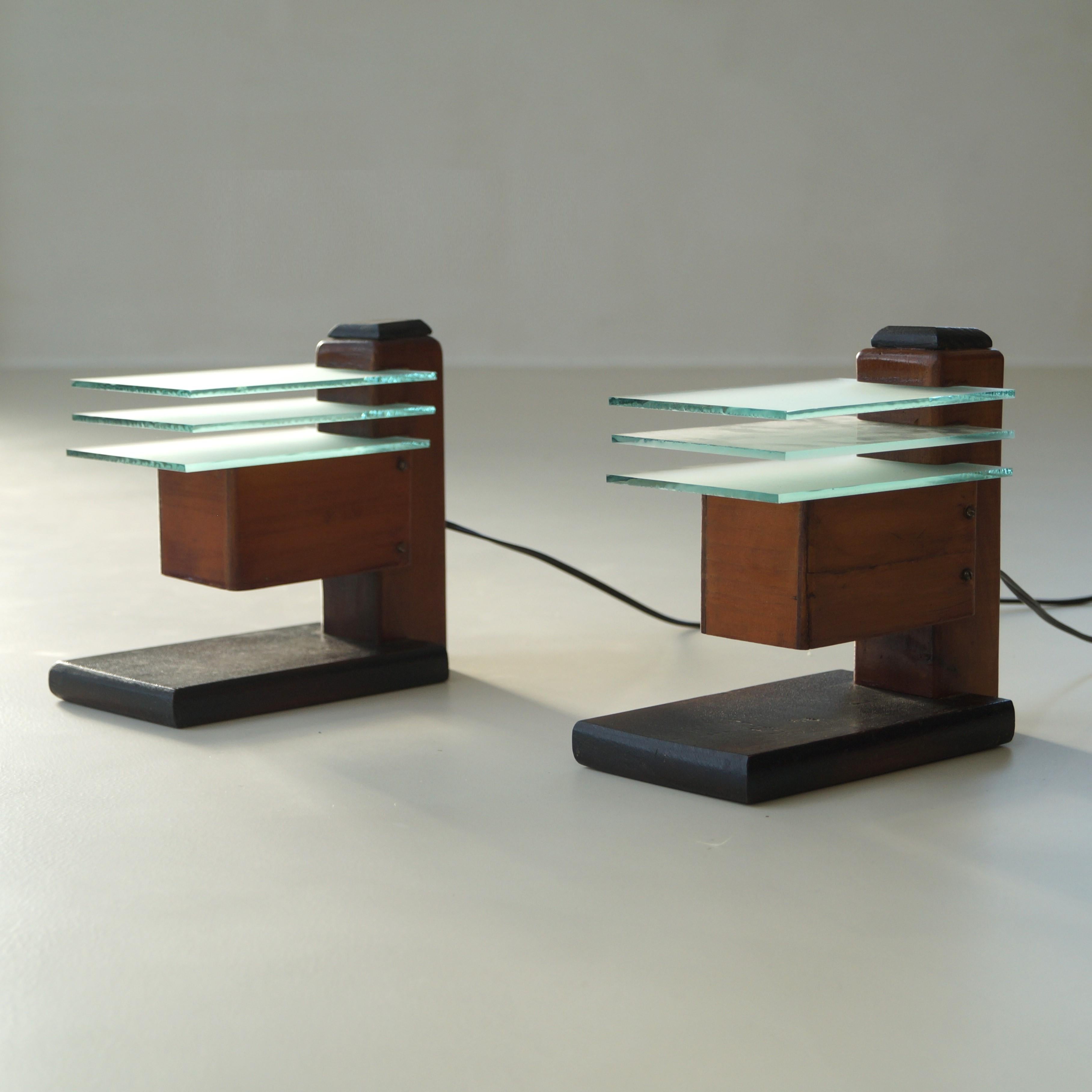 A set of modernist Frank Lloyd Wright inspired table lamps or bedside lamps, ca. 1920. These lamps come from a private collection and were once purchased in Amsterdam. They were bought as a wedding present at the time, possibly at Metz & Co, the