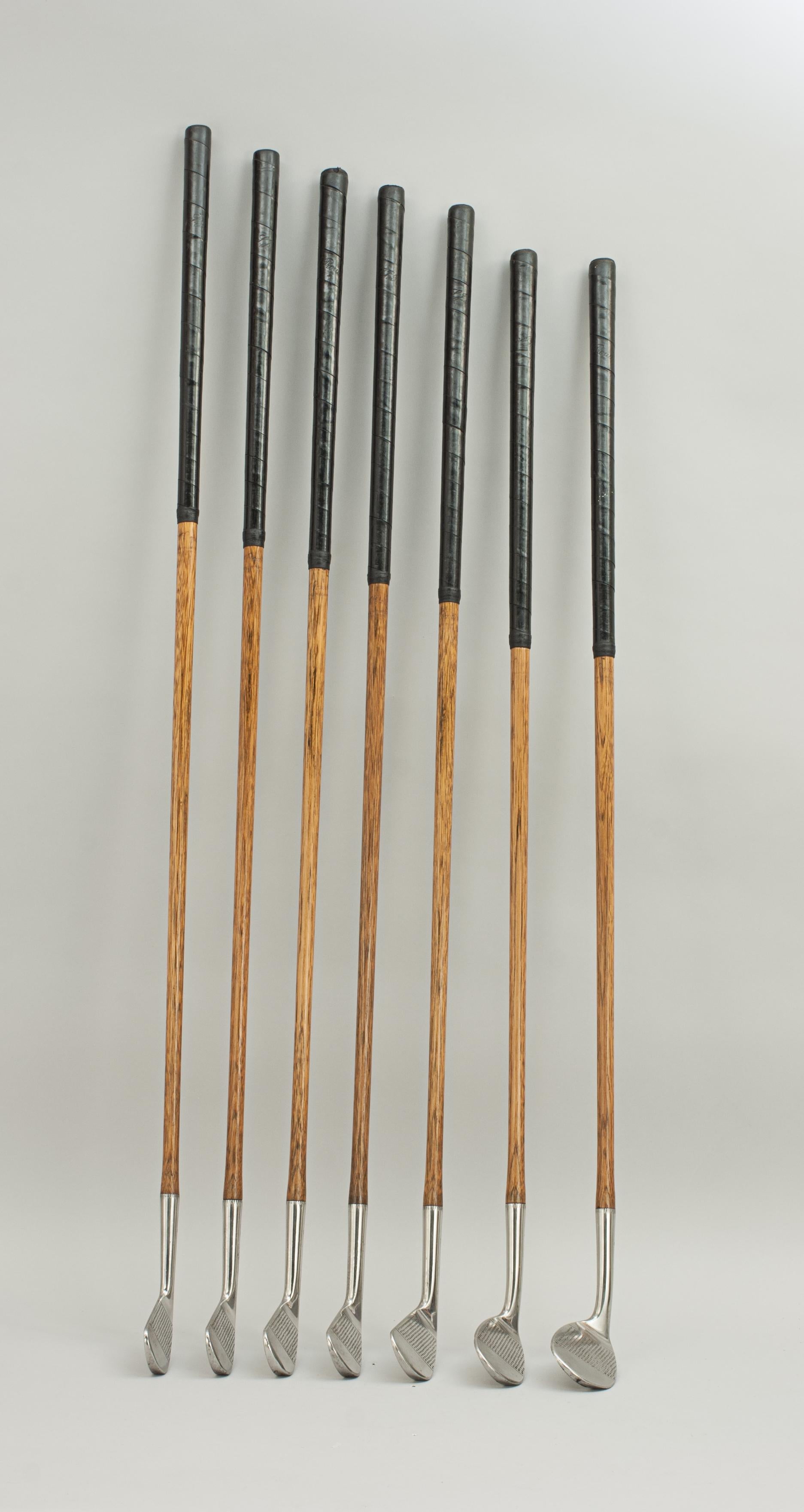 Set of six playable Hickory Golf clubs.
A good set of six hickory-shafted golf clubs by Charles Parsons of East Brighton golf club. The set includes 2 woods, Mid-iron, Mashie, Niblick and a Putting Cleek. The clubs are all branded 'Chas Parsons',