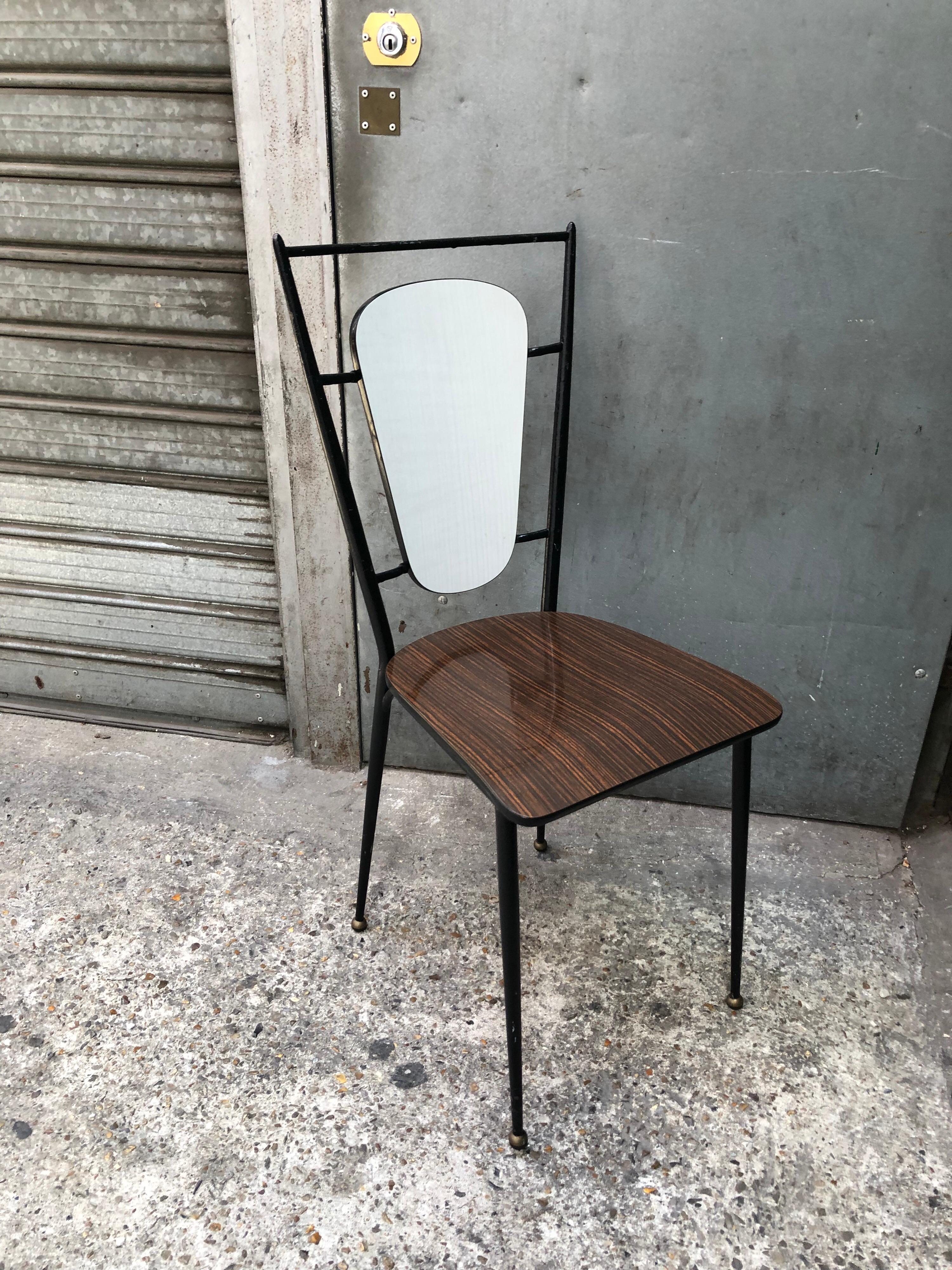 Iron and formica chairs from the 1960s.