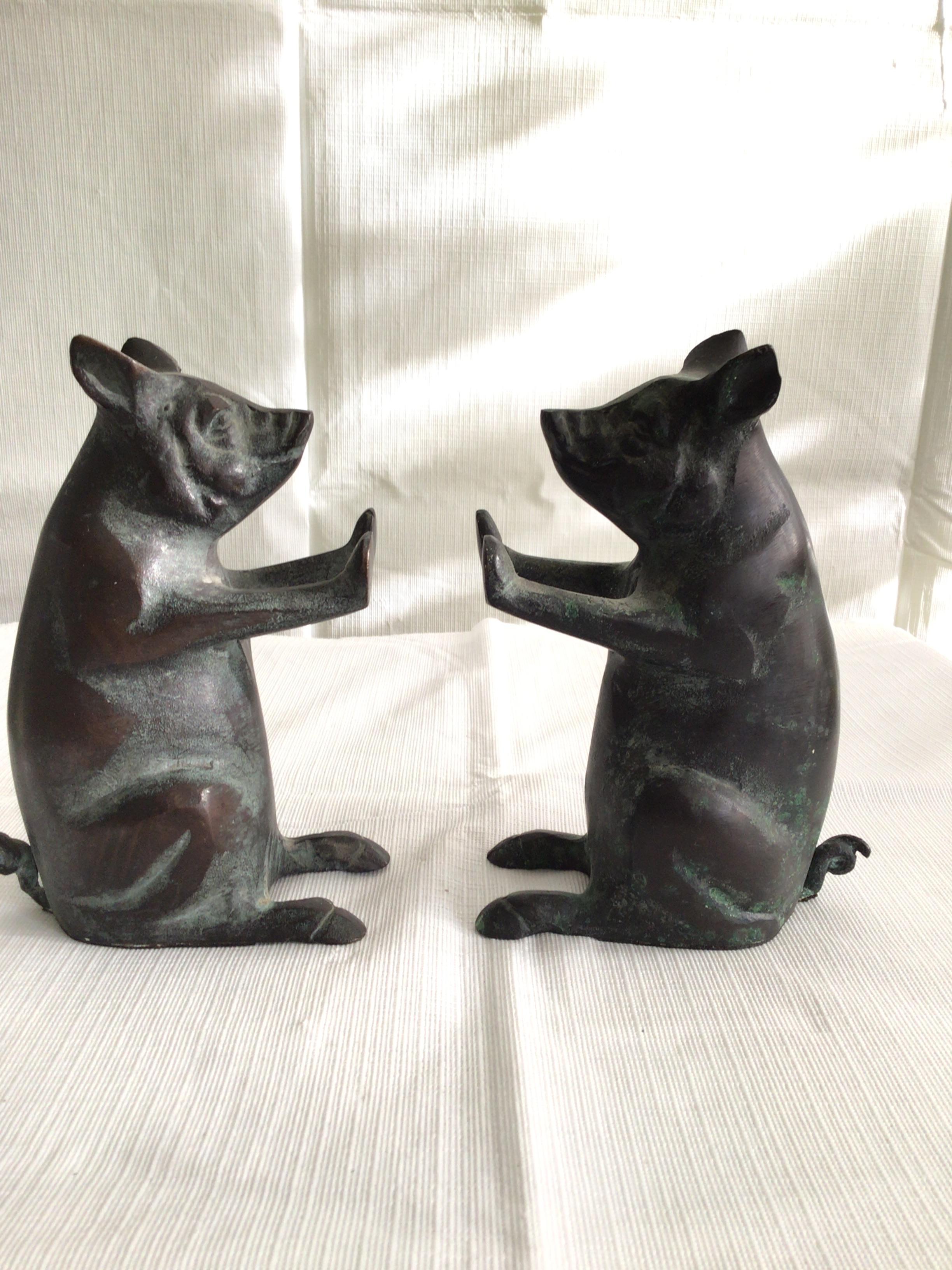 Set of 1960s bronze pig bookends.