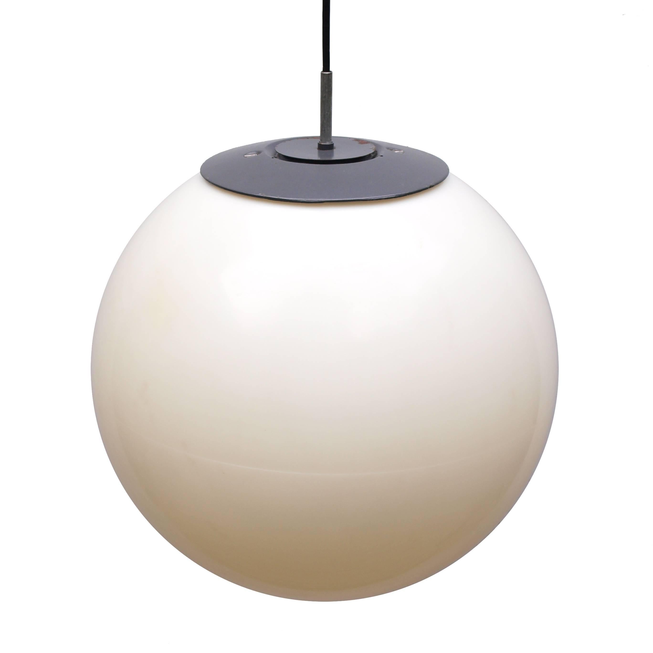 A set of 1960s three large adjustable ball hanging lights in white plastic with metal top fixings.