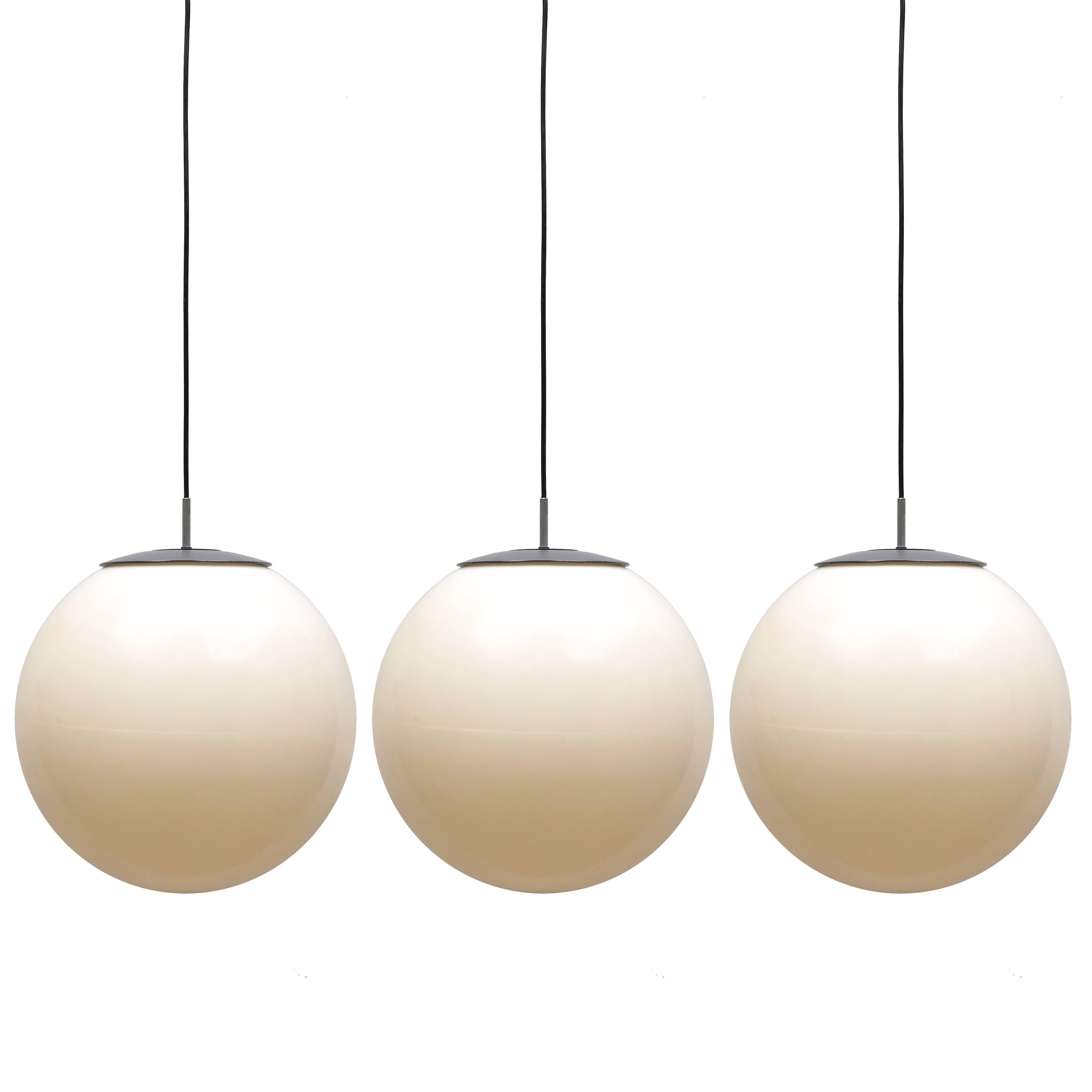 Set of 1960s Three Large Ball Hanging Lights in White Plastic For Sale