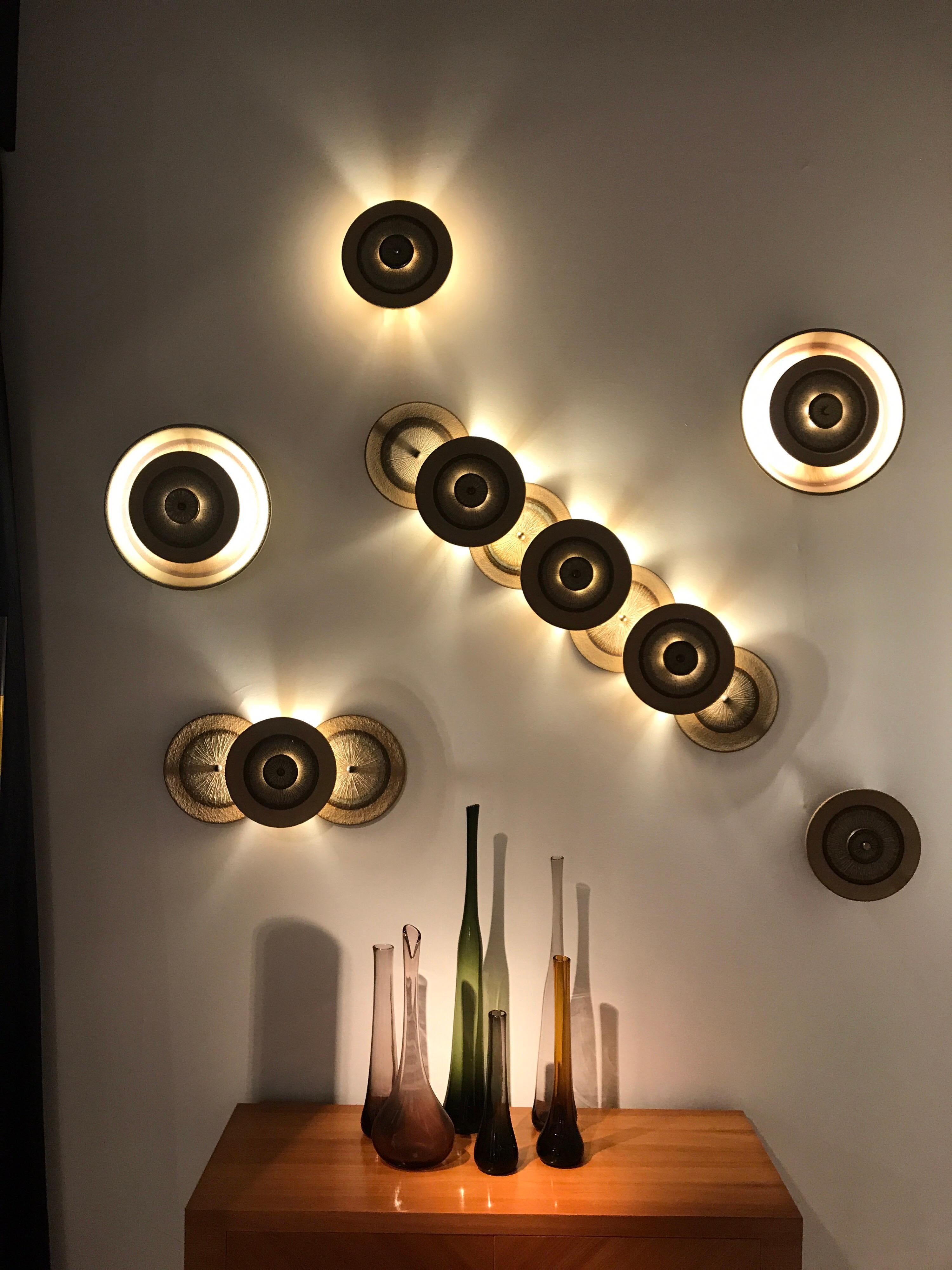 6 ceramic wall lights by Soholm
Designed by Noomi Backhausen and Poul Brandborg
Original Label for this vintage pieces in great condition 
Denmark circa 1970

Dimensions:
small single: 25 cm diameter
med single :37 cm diameter
3 disc: 55cm x