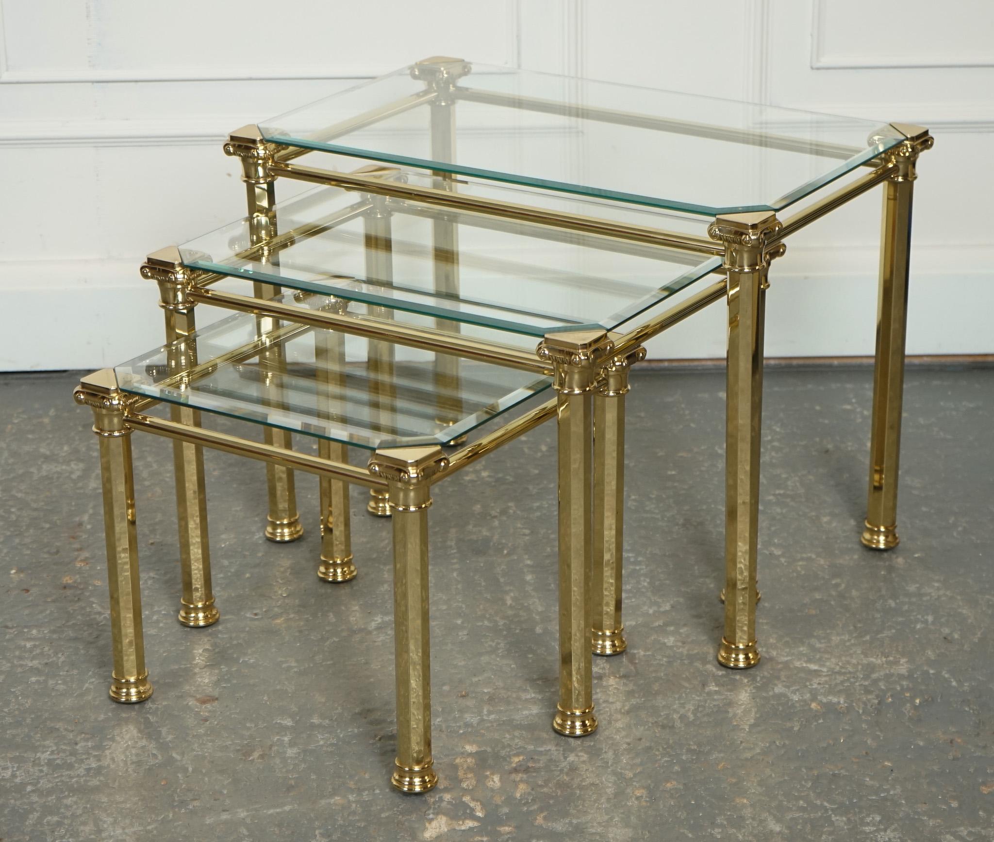 We are delighted to offer for sale this Set of 1970s Hollywood Regency Brass & Glass Nest of Tables Including the Side Table.

A luxurious and glamorous piece of furniture that embodies the opulence and extravagance of the Hollywood Regency style
