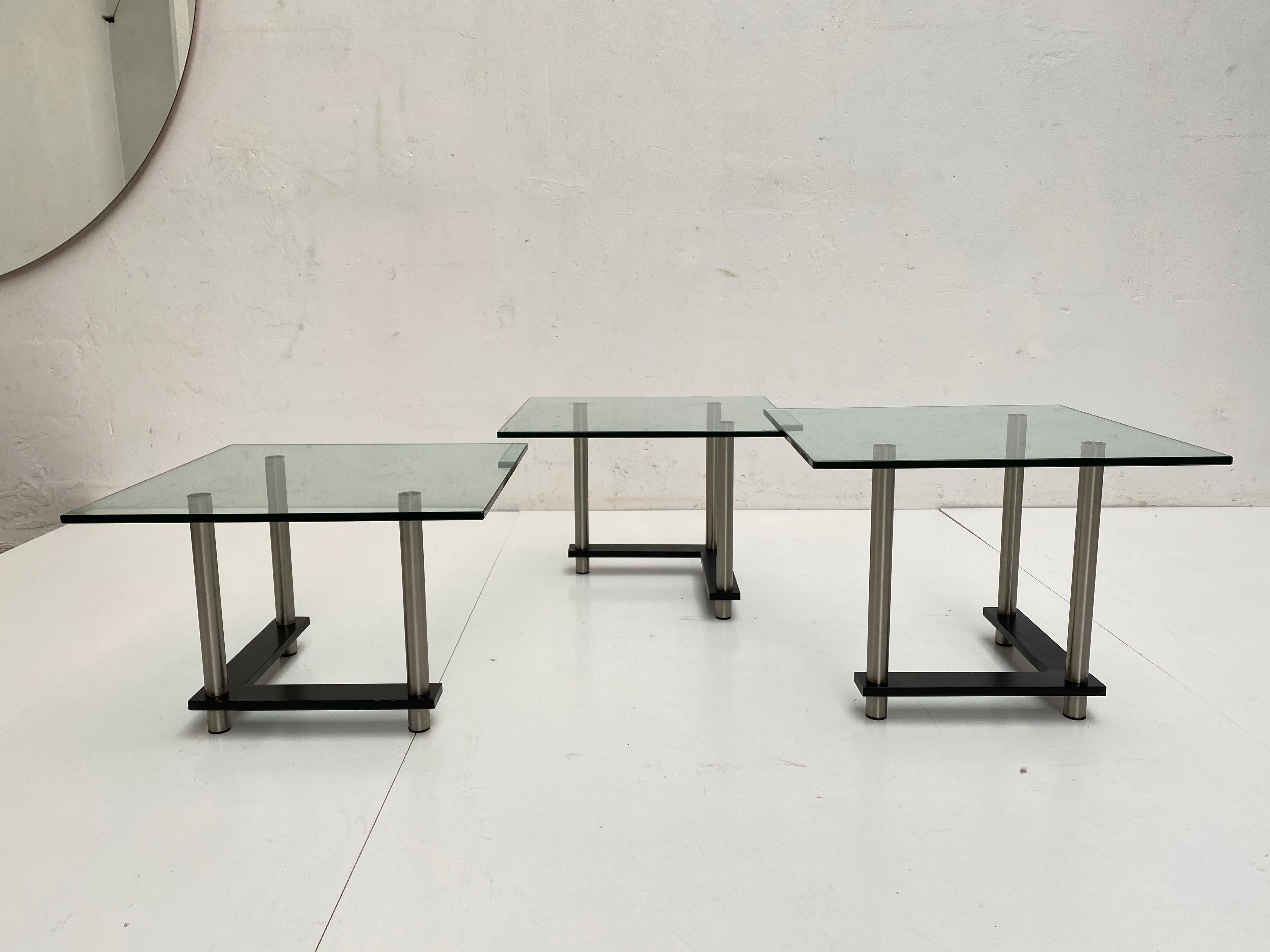 Dutch Set of 1980s Postmodern Nesting Tables in Tempered Glass and Stainless Steel