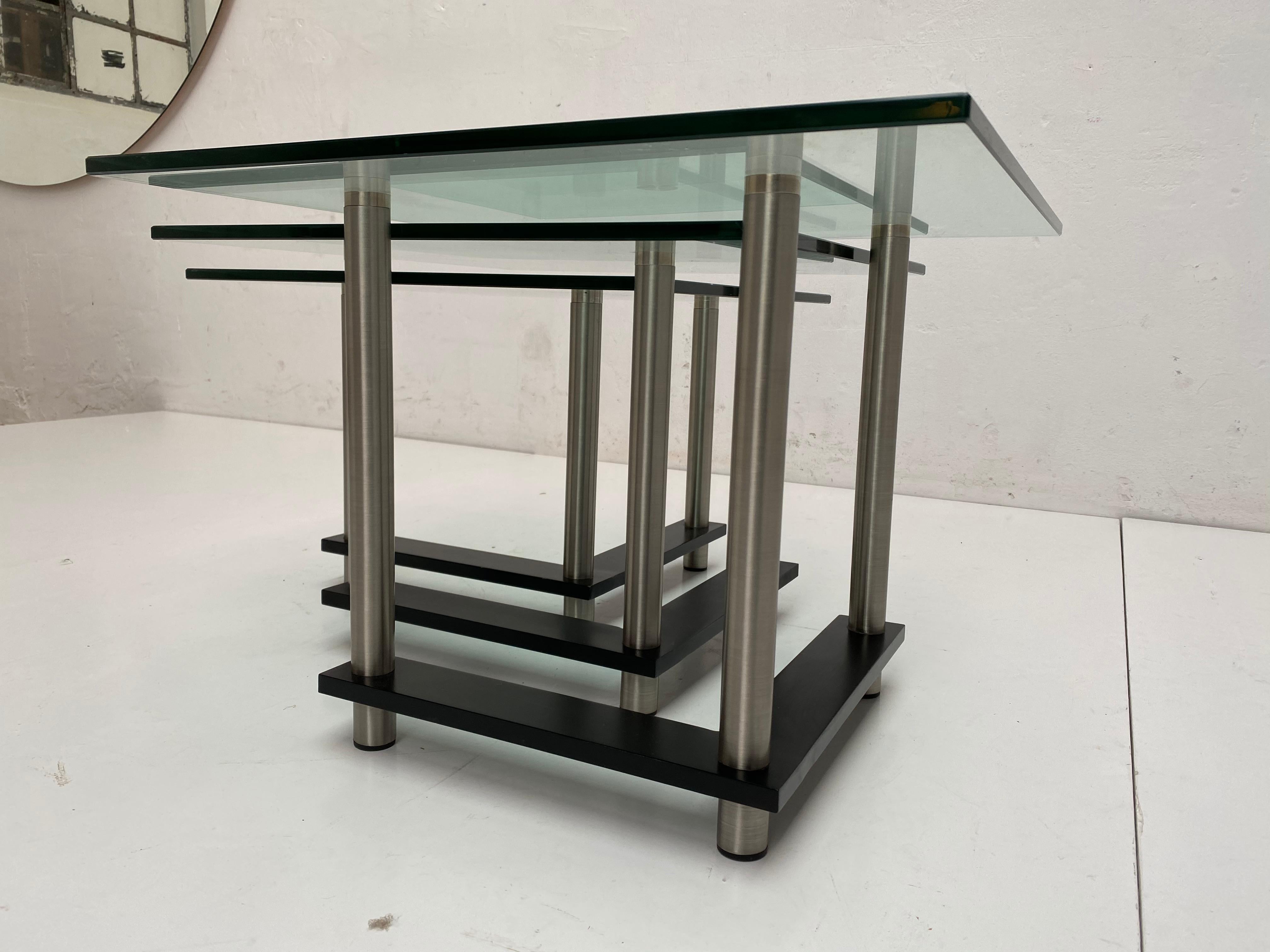 Late 20th Century Set of 1980s Postmodern Nesting Tables in Tempered Glass and Stainless Steel