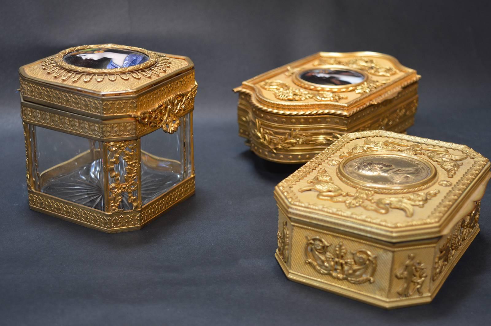 Three 19th century boxes. Hand-painted
Square glass box is 3.5