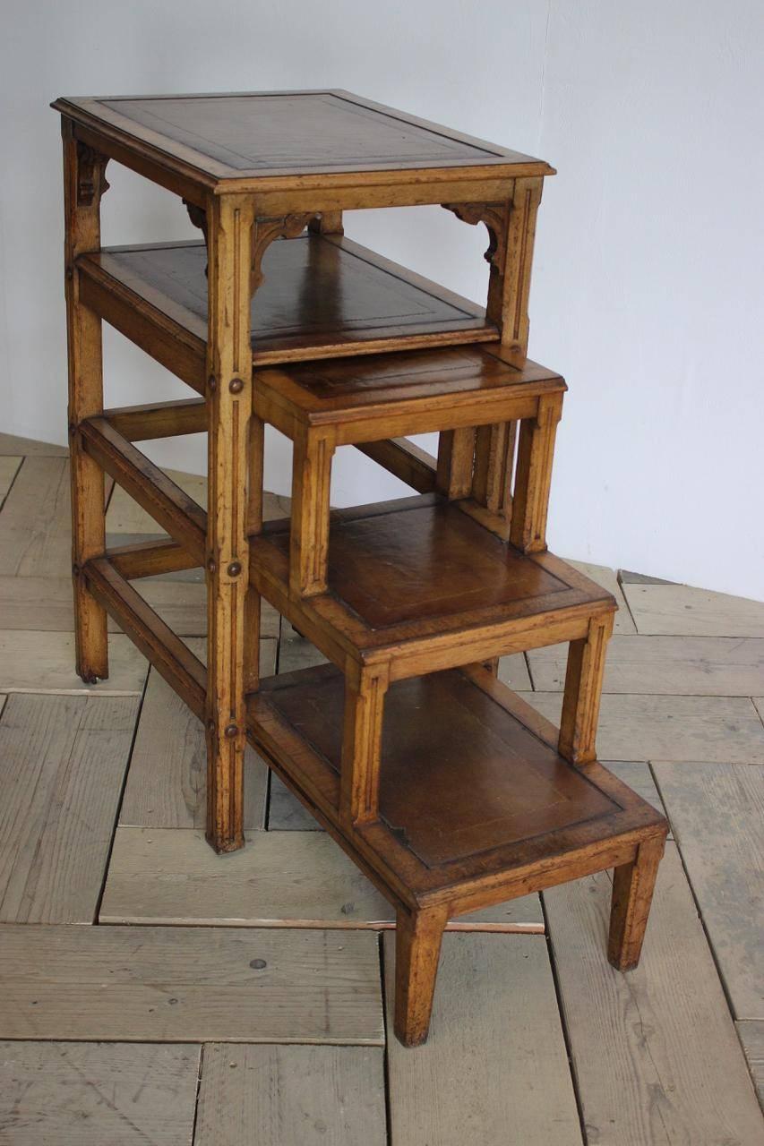 A great set of 19th century English country house library steps of fine quality in oak with brass castors and gilt tooled leather.