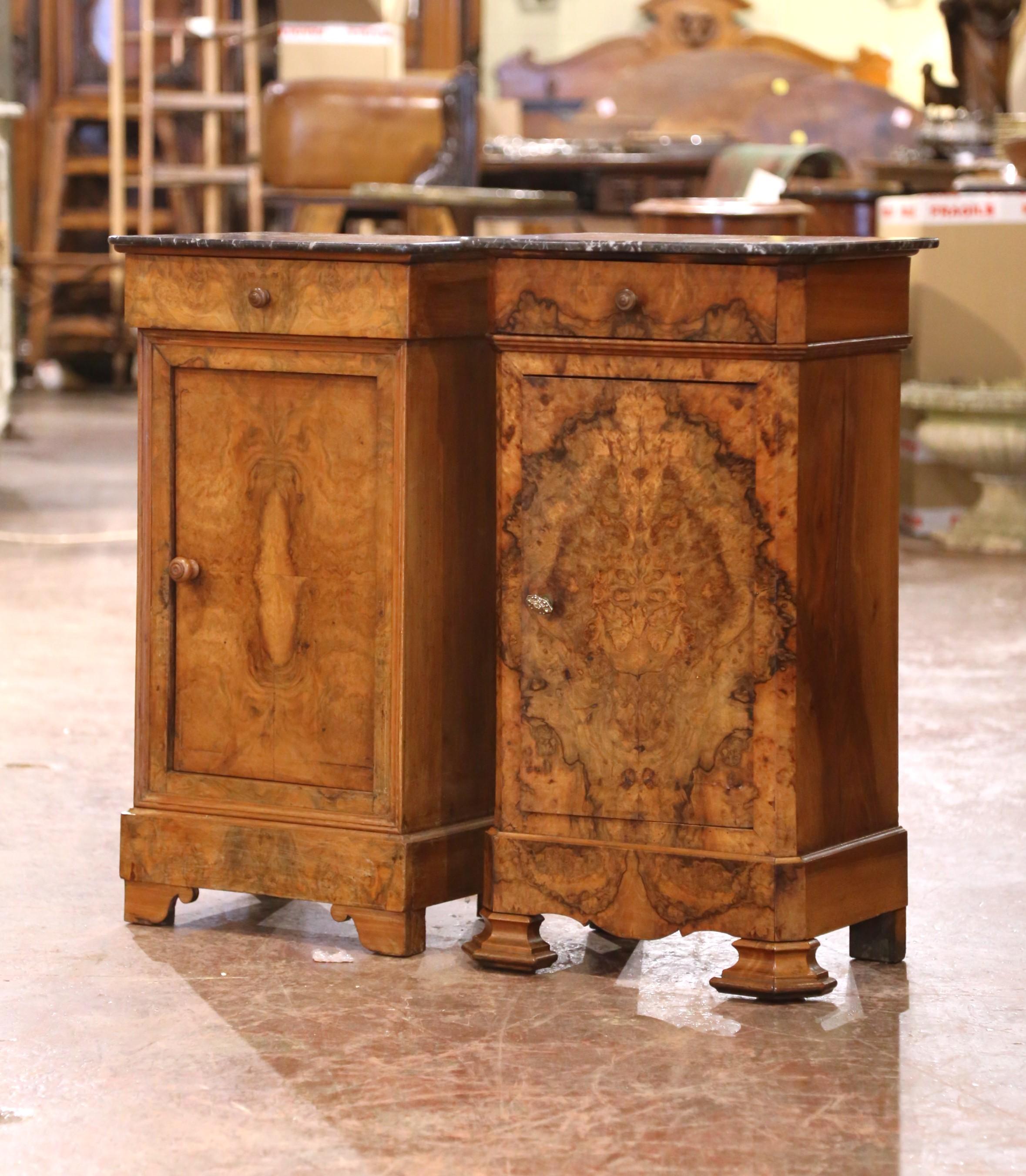 Add surface space in your bedroom with this charming “Fausse Paire” of antique nightstands. Crafted in France circa 1880, each piece is topped with a rectangular black marble surface featuring white veining, a refined contrast to the warm wood
