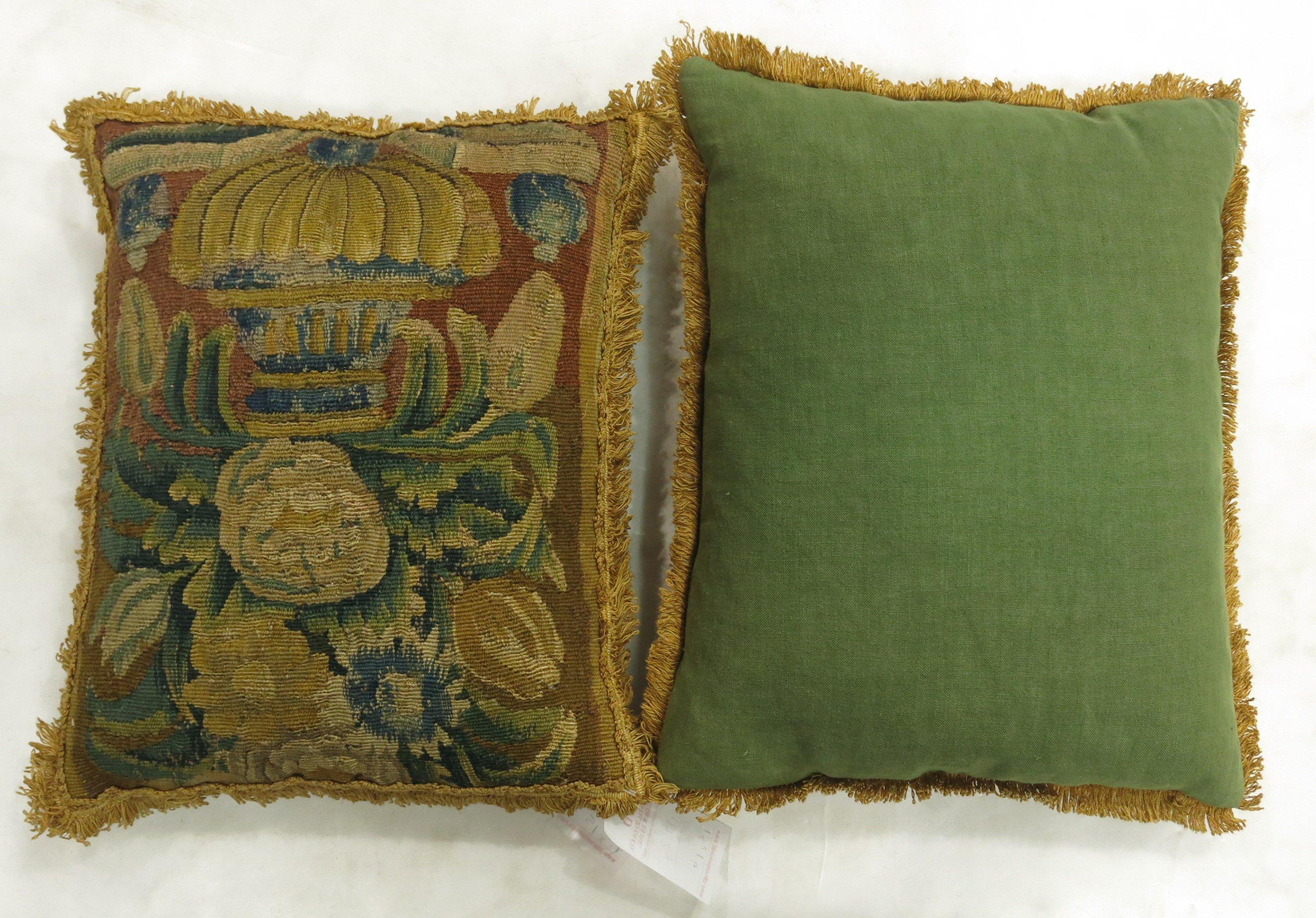 An exquisite set of 19th century green French tapestry verdure pillows woven wool with Fine quality wool and silk. Great colors and patina on both. 

Measuring 14'' x 17'' individually. Both have been sewn shut.