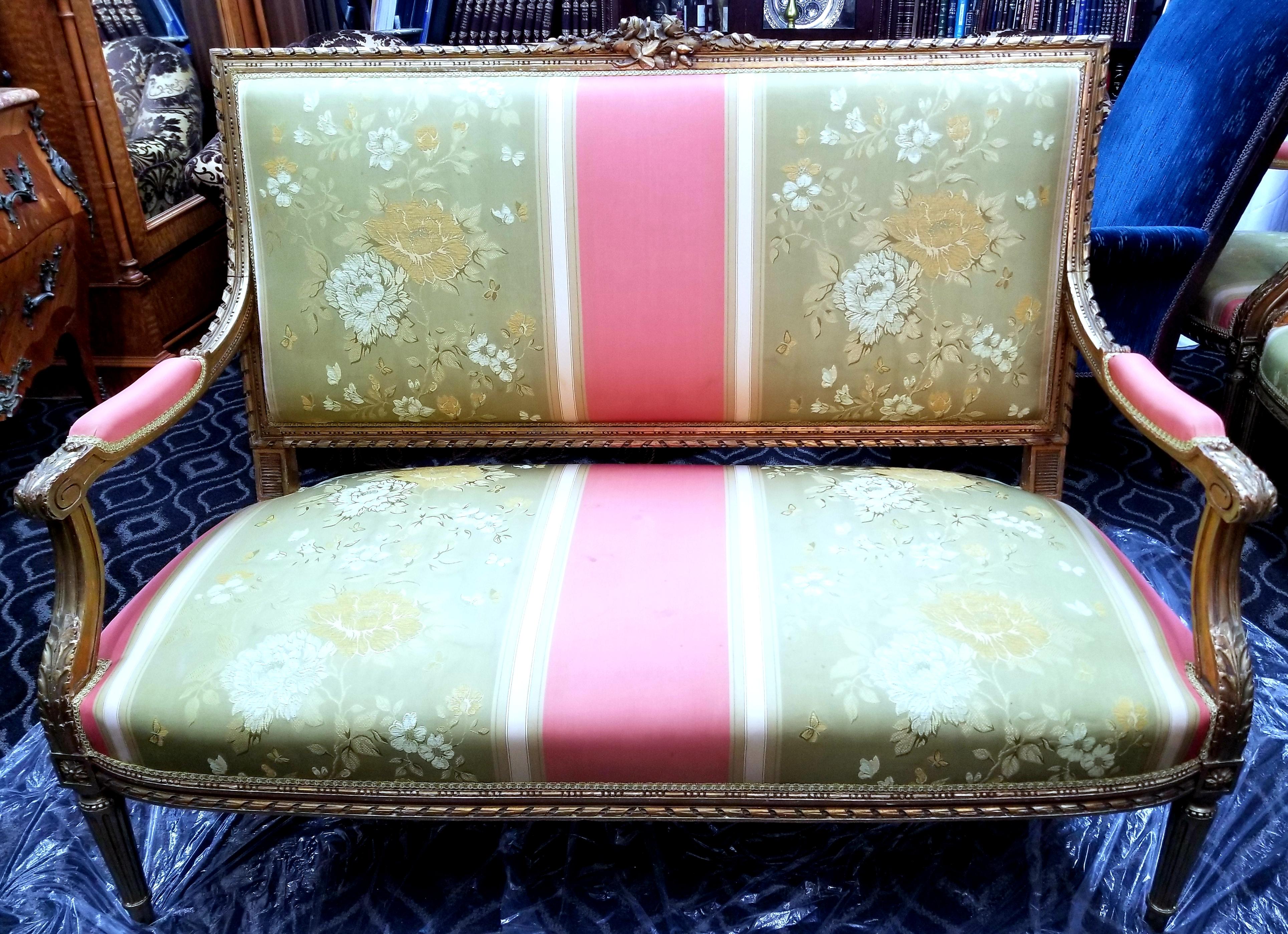 Carved Set of 19th Century Louis XIV Giltwood Armchairs with Matching Footstools For Sale