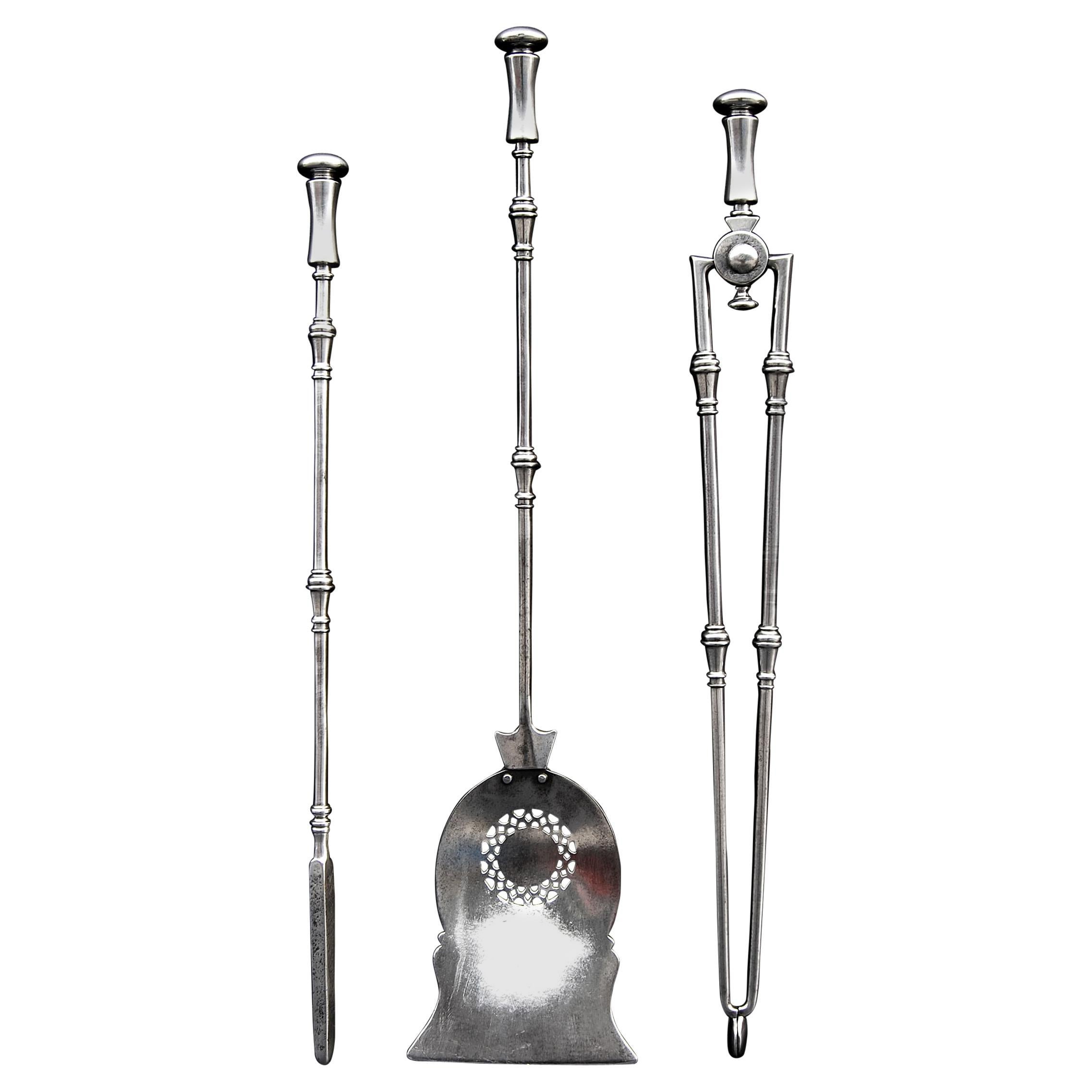Set of 19th Century Pierced Steel Fire Irons For Sale