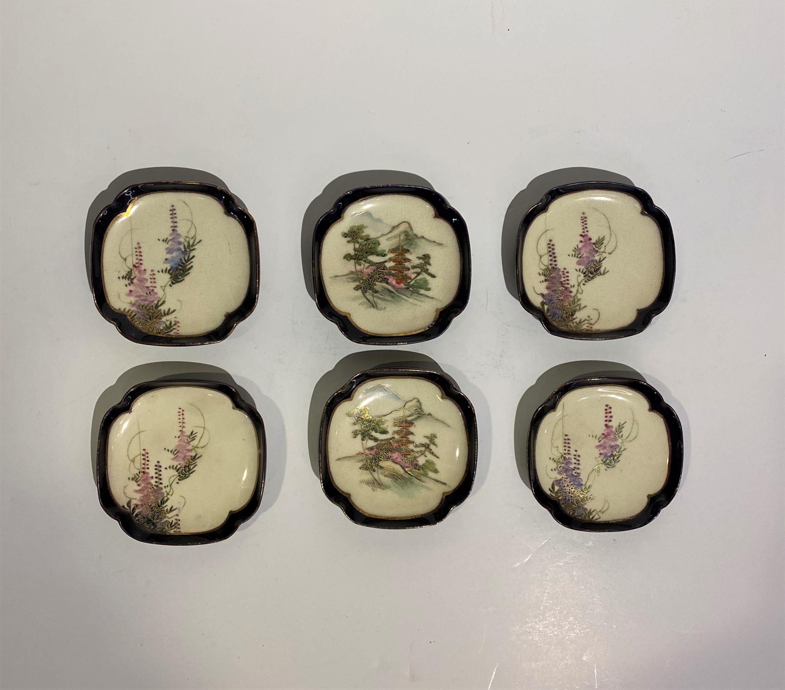The attractive set of 19th-century small, shaped, hand-painted Satsuma pin trays is a collection of delicate and ornate pieces that showcase the artistry of Satsuma ware from the Meiji period in Japan.

Each pin tray in the set is crafted with