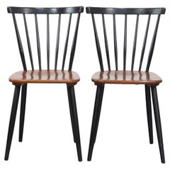 Set of 2 1960s vintage Scandinavian design dining chairs with spindle backrests