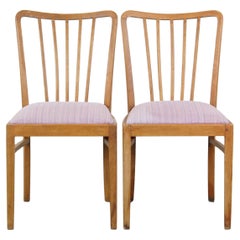 Ensemble de 2 chaises de salle à manger vintage des années 1970  avec dossier en fuseau et assise en tissu