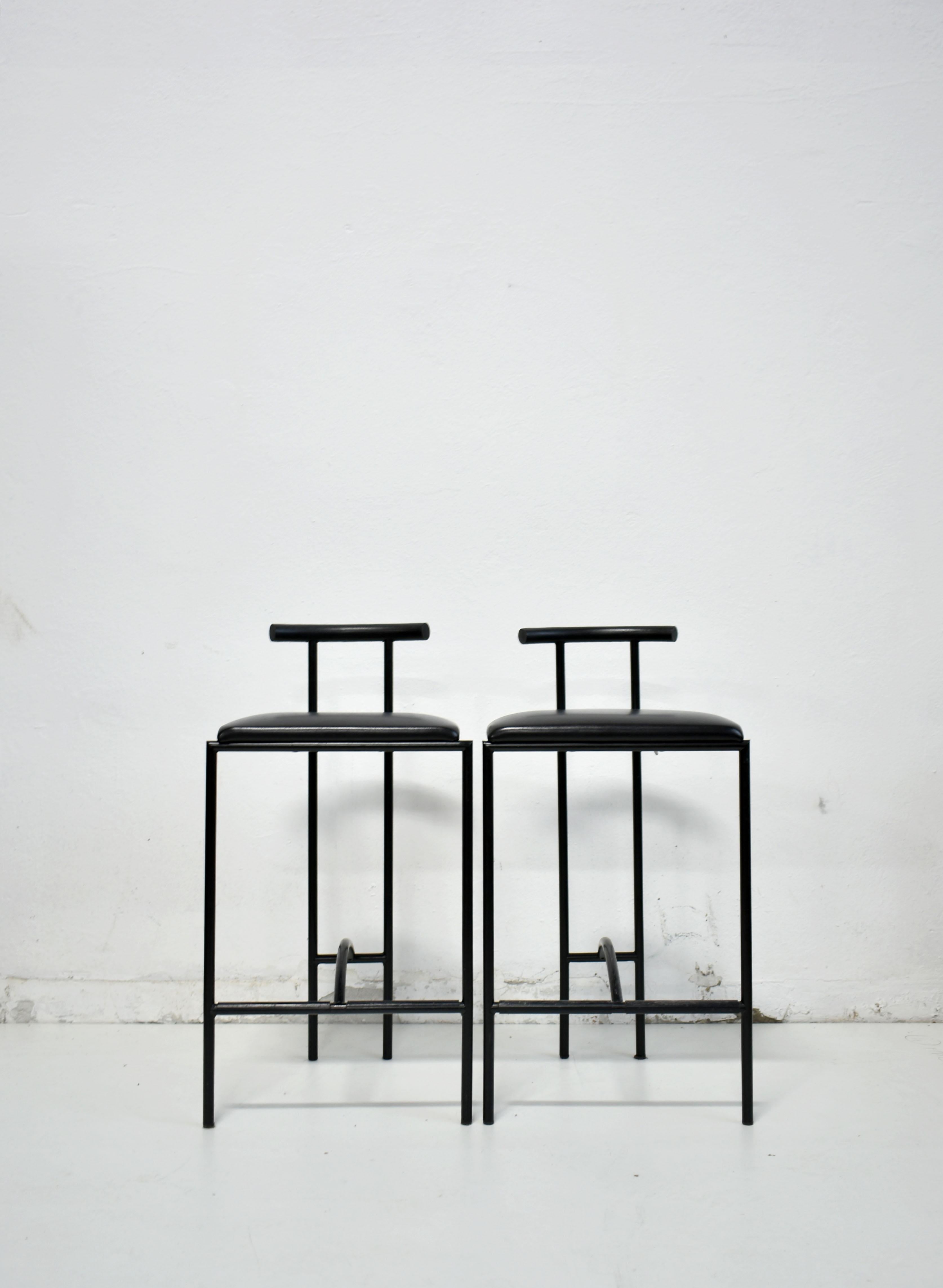 Famous design from the 1980s, Tokyo bar stools by Rodney Kinsman, produced by Bieffeplast, Italy. The stools were originally designed for London’s Groucho club.

Stools have a Minimalist black powder-coated tubular steel frame with a black vinyl