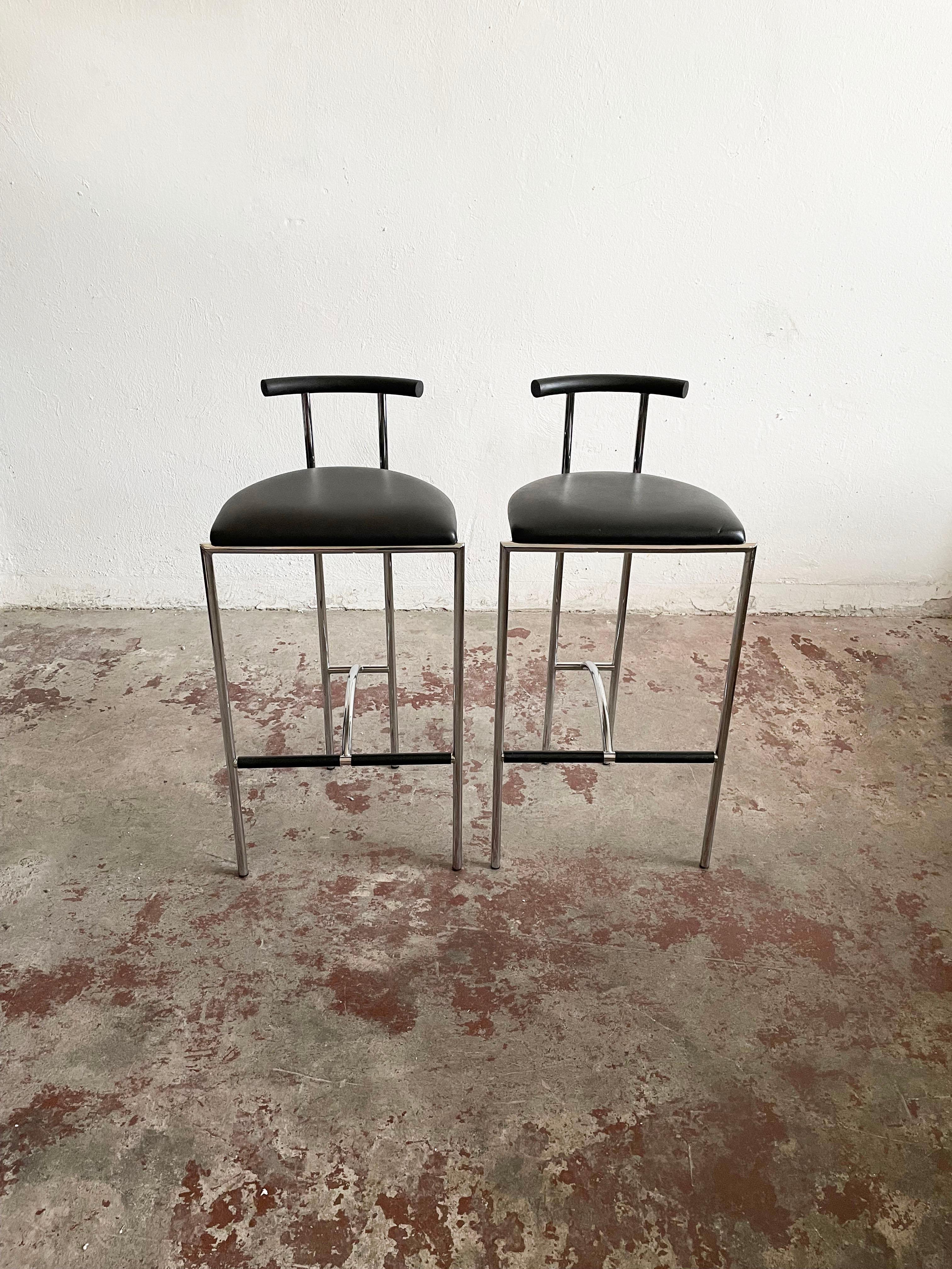 Famous design from the 1980s, Tokyo bar stools by Rodney Kinsman, produced by Bieffeplast. Italy. The stools were originally designed for London’s Groucho club.

Stools have a minimalist chrome tubular steel frame with a black vinyl