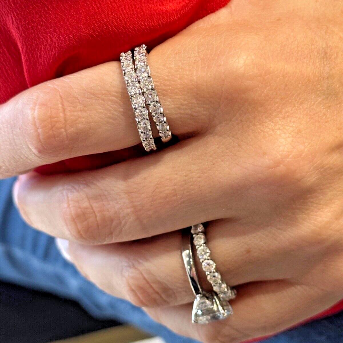 Style​​​​​​​ : Half Eternity Band

Metal: White Gold

Metal Purity: 14K

Stone: Diamonds

Stone count: 24 Total

Total Carat Weight: 1.3CT Each 2.6CT Total

Stone colorG-H / VVS1

Ring Size: 8.75 (Sizable)

Weight : 6.3g total

Includes:   24 Month