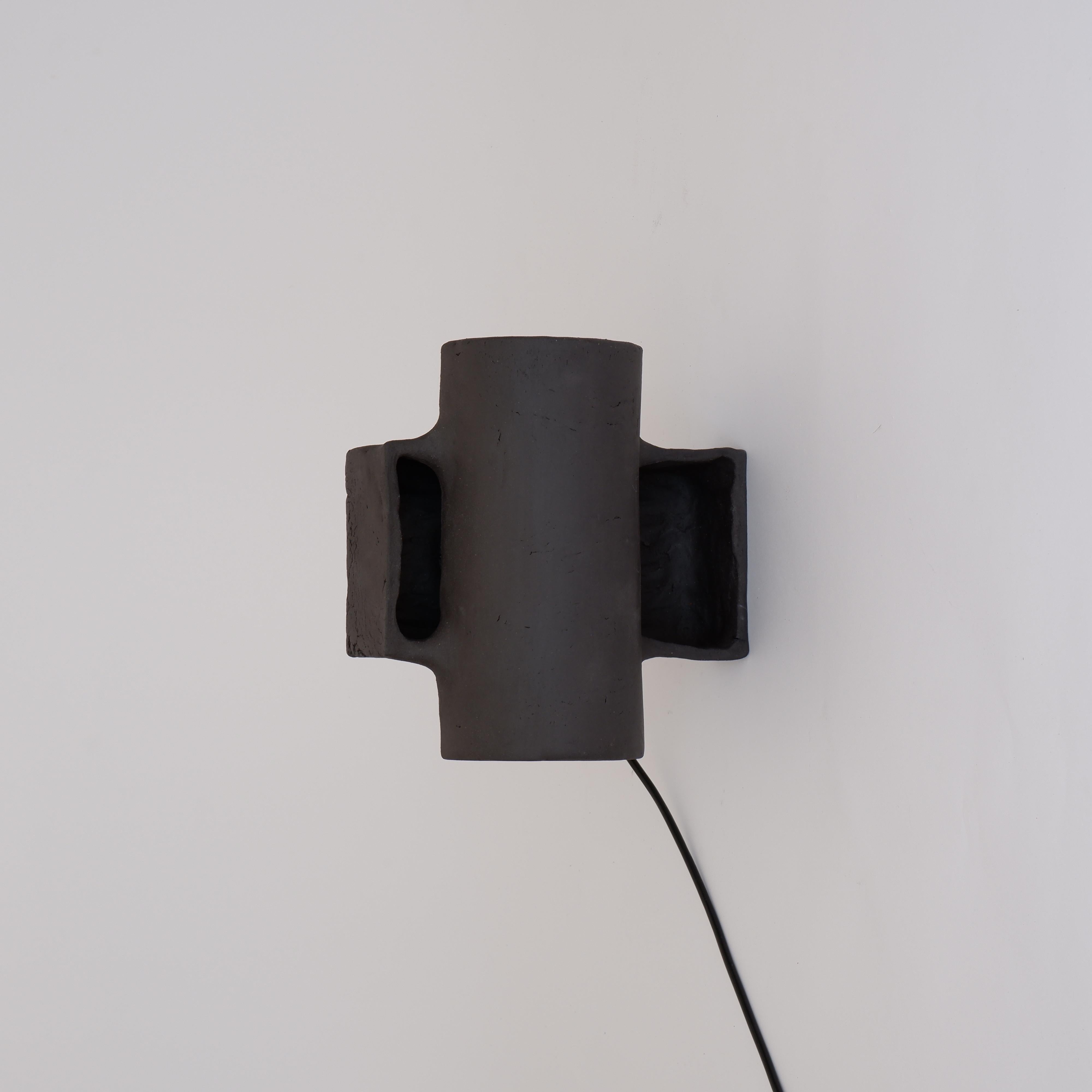 Set Of 2 Accre Small Lamps by Ia Kutateladze
One Of A Kind.
Dimensions: D 20 x W 23 x H 22 cm (each).
Materials: Clay.

Each piece is one of a kind, due to its free hand-building process. Different color variations available: raw black clay, raw