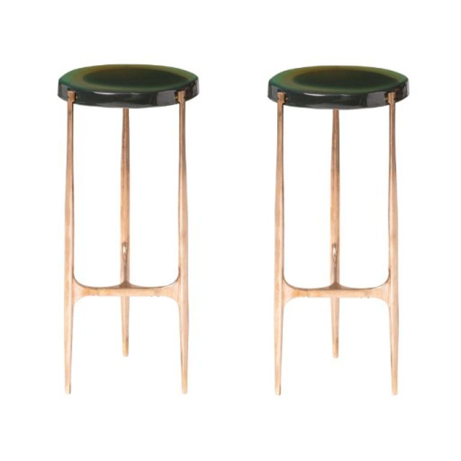 Set of 2 agatha coffee tables by Draga & Aurel.
Dimensions: W 24 x D 24 x H 56.
 top Ø 34 cm.
Materials: resin, bronze.

The Agatha coffee tables are featured by irregular circular tops of transparent and
colorful resin sit on a bronze frame