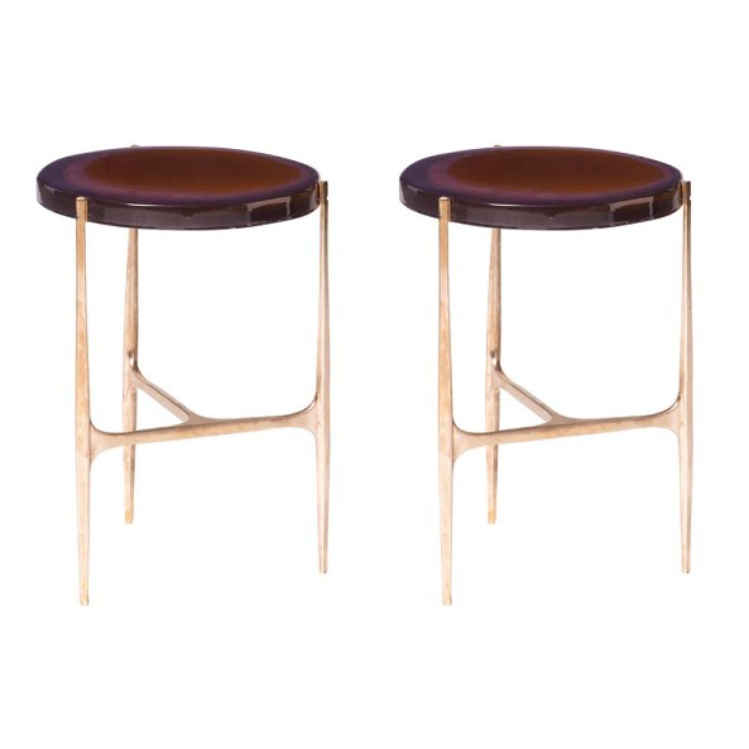Set of 2 Agatha coffee tables by Draga & Aurel
Dimensions: W 34 x D 34 x H 50
Top Ø 34 cm
Materials: Resin, bronze

The Agatha coffee tables are featured by irregular circular tops of transparent and
colorful resin sit on a bronze frame with a