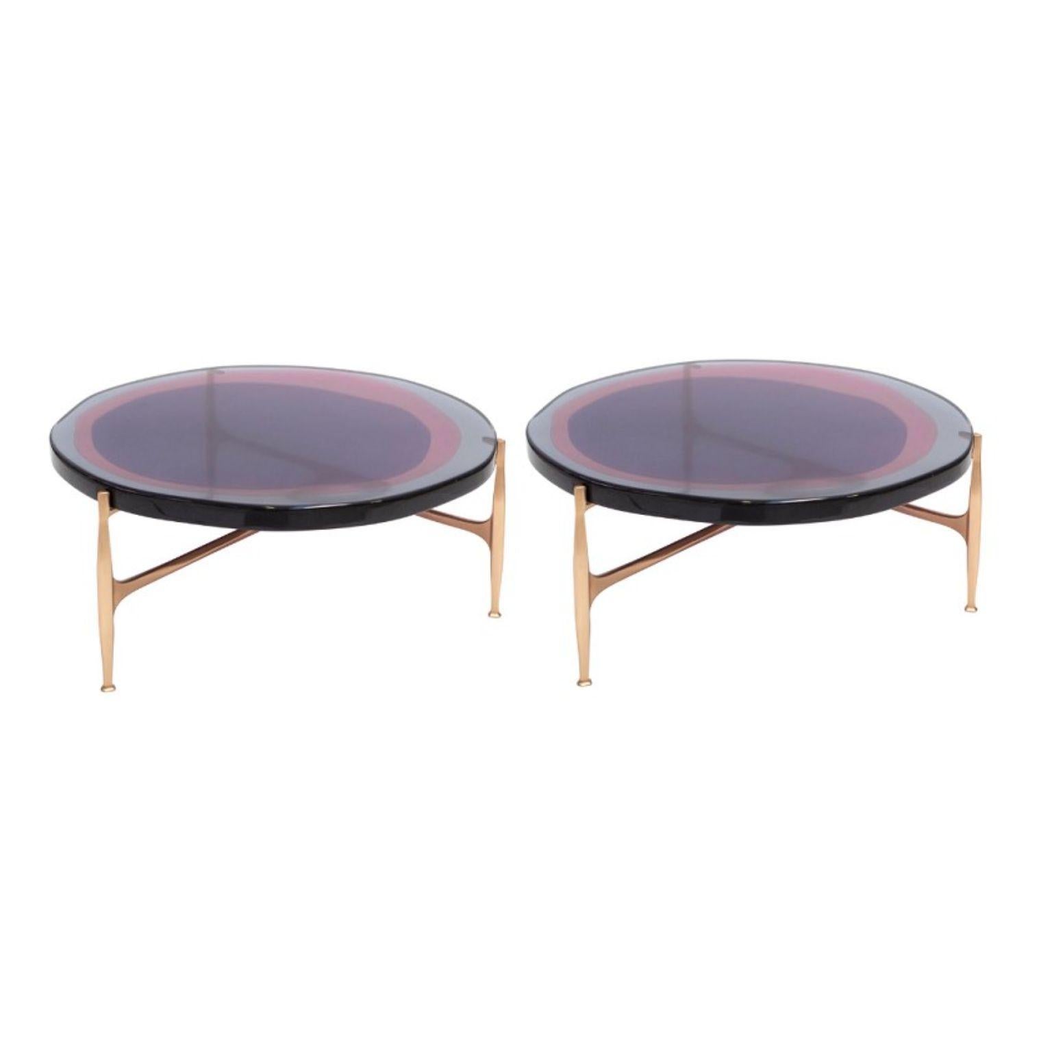 Set of 2 Agatha coffee tables by Draga & Aurel
Dimensions: W 90 x D 90 x H 36
 Top Ø 90 cm
Materials: Resin and bronze

The Agatha coffee tables are featured by irregular circular tops of transparent and
colorful resin sit on a bronze frame