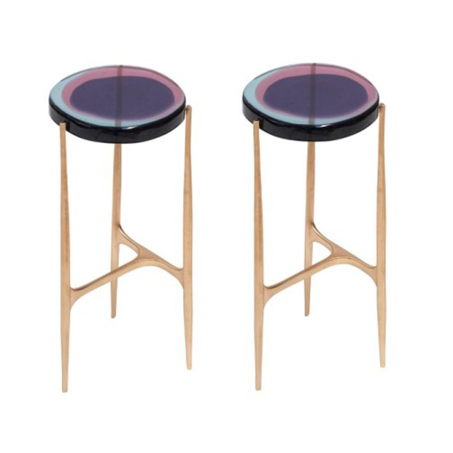 Set of 2 Agatha coffee tables by Draga & Aurel
Dimensions: W 24 x D 24 x H 56
Top Ø 34 cm
Materials: Resin and bronze

The Agatha coffee tables are featured by irregular circular tops of transparent and
colorful resin sit on a bronze frame with a