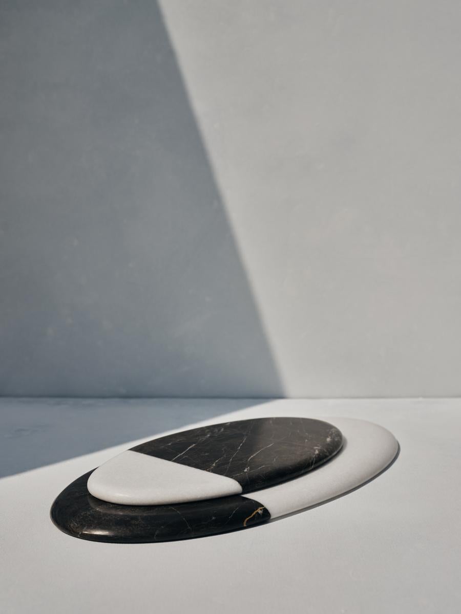 Set of 2 Aithra and Atkis trays by Faye Tsakalides
Dimensions: 
Small 16 W x 42 L x H 2 cm
Large 22W x 42 L x H 2cm
Materials: Marble volakas livadia. 
Technique: Hand-crafted, polished. 

Aithra & Aktis trays combine minimalism and