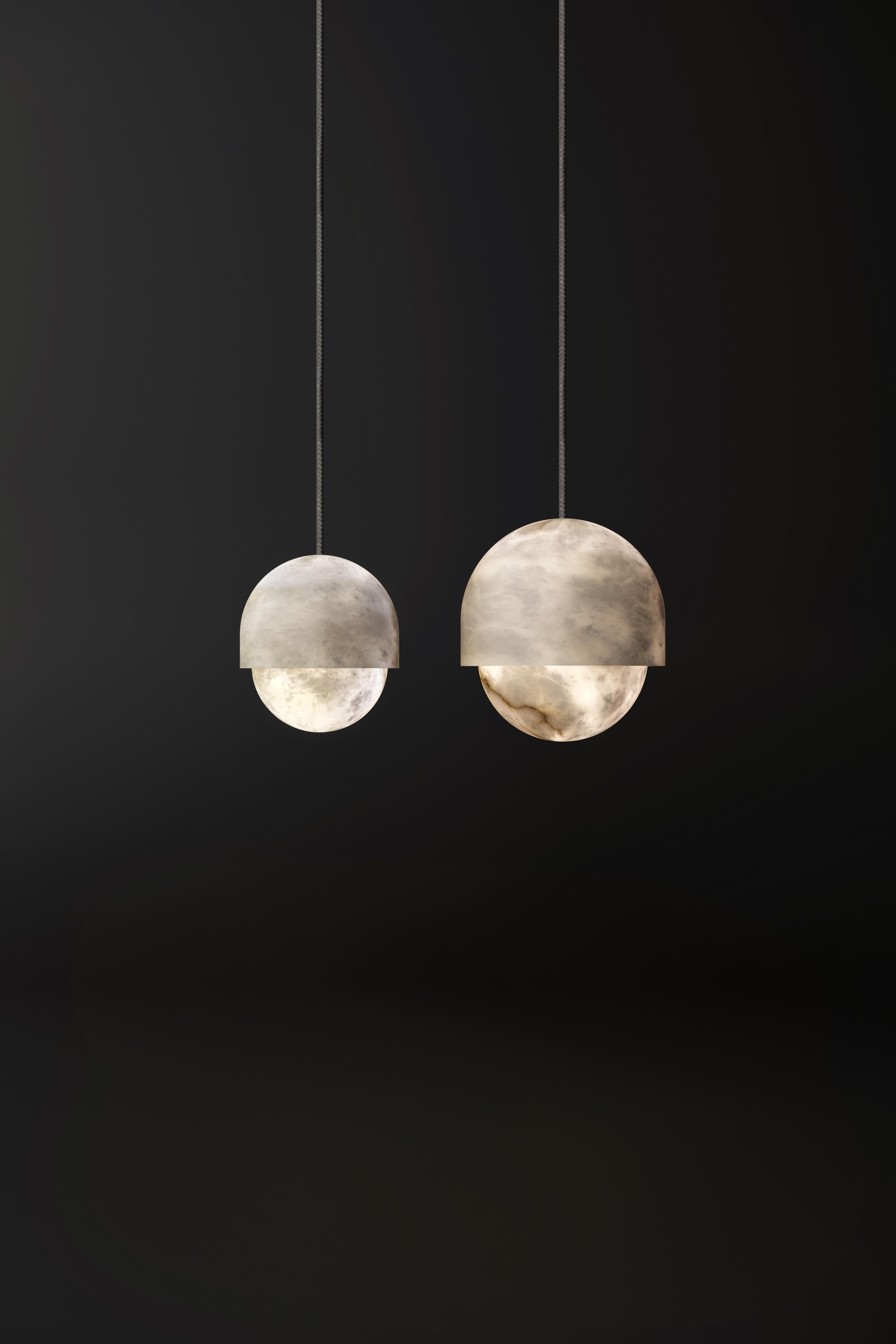 Set of 2 Alabaster Yoko pendant light by Atelier Alain Ellouz
Collection Edition
© Atelier Arnaud Sabatier
Dimensions: Ø 5.5’’ x 6.3’’
 Ø 7’’ x 7.8’’
Materials: Alabaster
Weight: 2,2 lb, 3.3 lb


Textile cable - Length to adjust on site