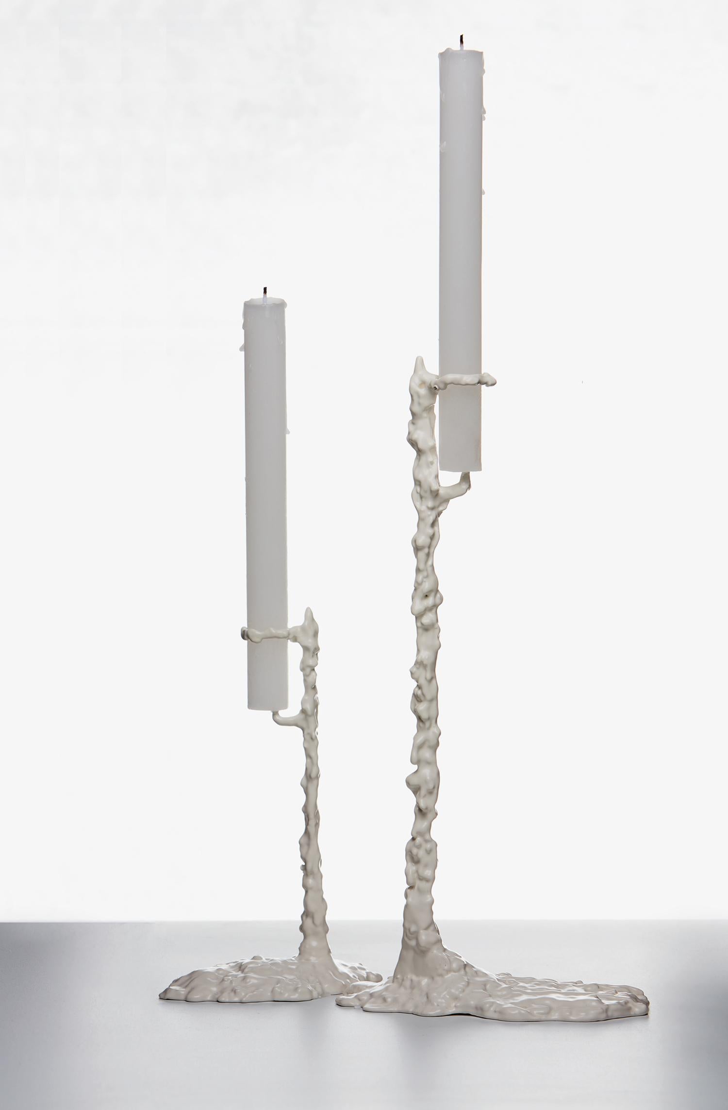 Set of 2 Alberto Candleholders by Oscar Tusquets
Dimensions: High: D 8 x W 12 x H 28 cm.
Low: D 6 x W 10 x H 20 cm.
Materials: Cast iron painted in matte white.

Available in two different sizes: low (D 6 x W 10 x H 20 cm) and high (D 8 x W 12