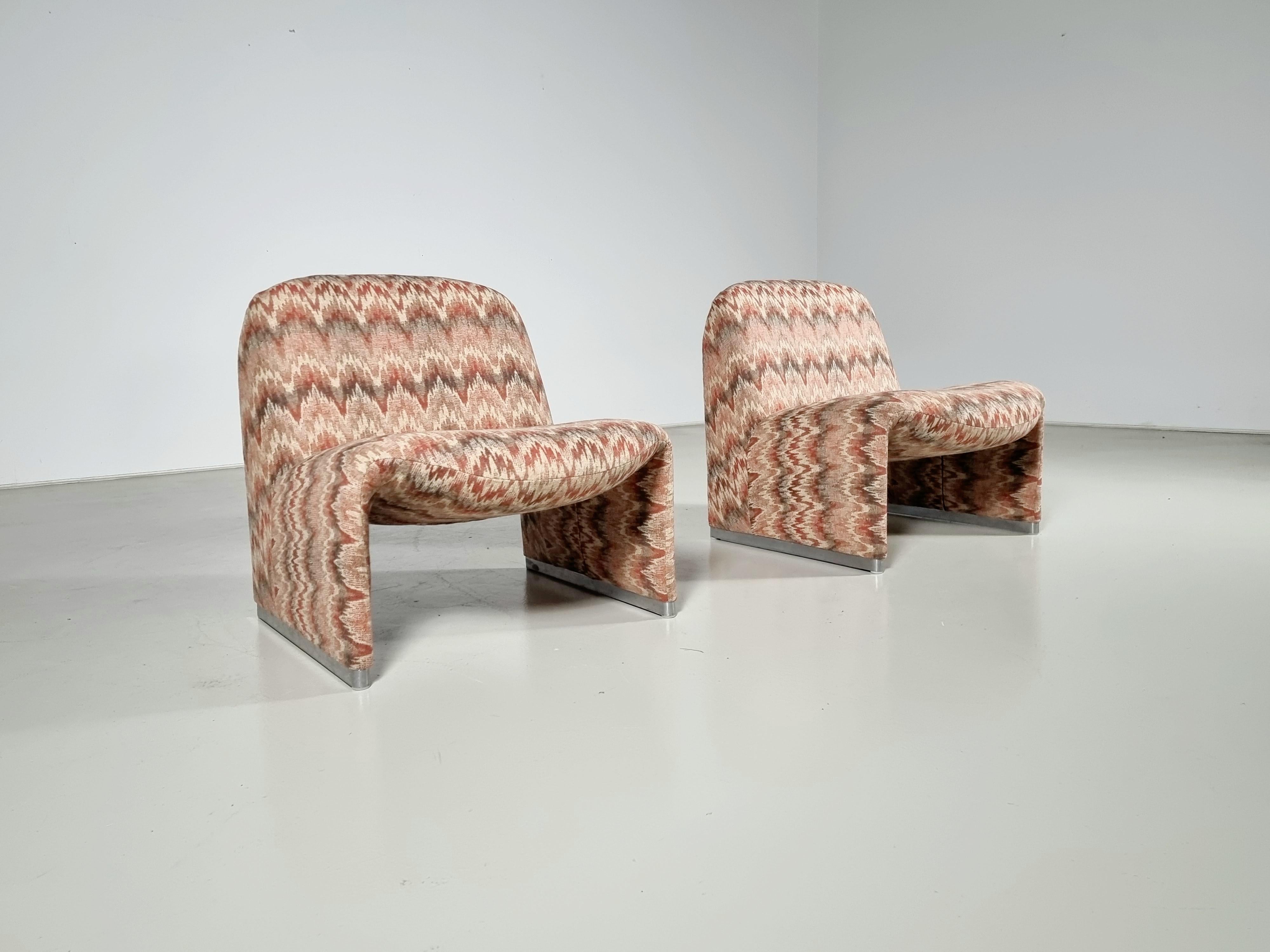 Giancarlo Piretti Alky chairs. Produced by Castelli and Artifor in the 1970s. Reupholstered in stunning wool fabric with amazing print. Aluminum frame and polished chrome footrests. Beautiful organic curves are reminiscent of Pierre Paulin's designs.
