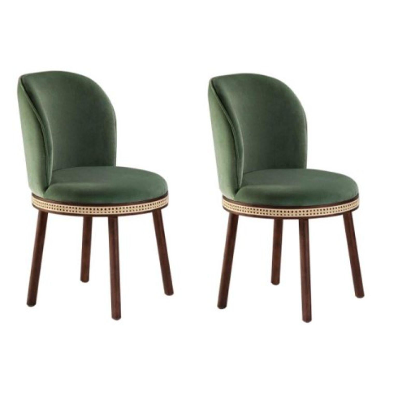 Set of 2 Alma chairs by Dooq
Measures: W 51 cm 20”
D 53 cm 21”
H 86 cm 34”
Seat height 49 cm 19”

Materials: Upholstery fabric or leather; structure solid wood feet lacquered MDF or solid wood rattan natural rattan. COM with natural walnut or