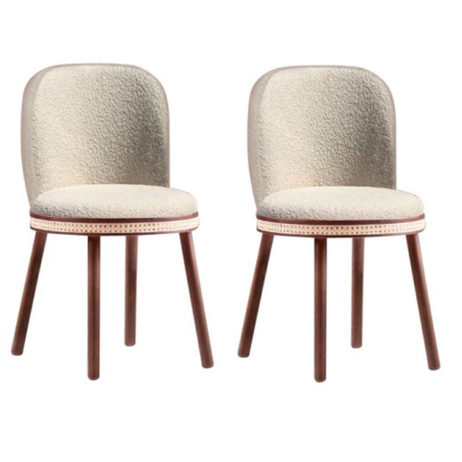 Set of 2 alma chairs by DOOQ
Measures: W 51 cm 20”
D 53 cm 21”
H 86 cm 34”
Seat height 49 cm 19”

Materials: Upholstery fabric or leather; structure solid wood feet lacquered MDF or solid wood rattan natural rattan. COM with natural walnut or