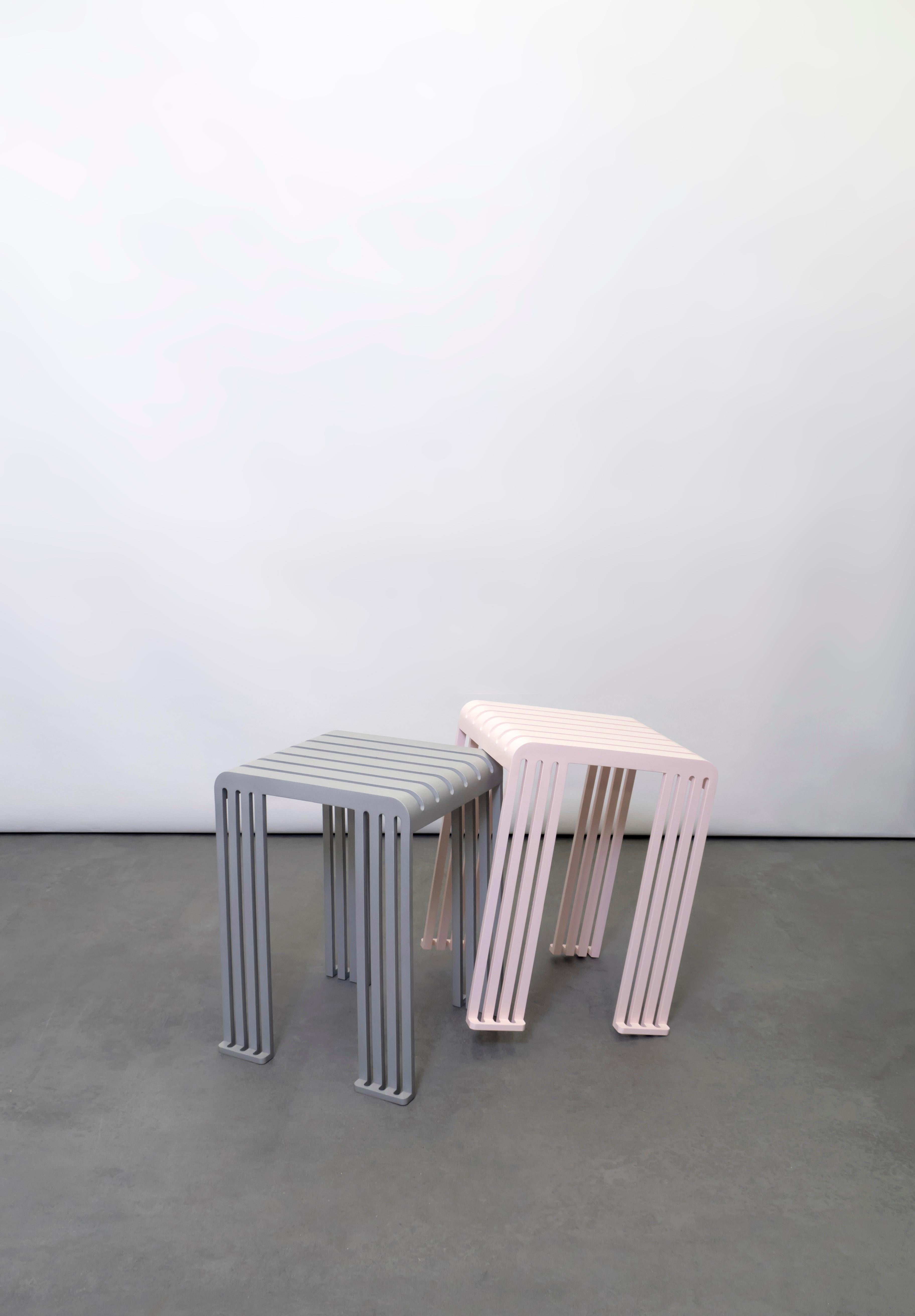 Set of 2 aluminium Tootoo stools by Helder Barbosa
Materials: Aluminium
Dimensions: 34 x 29 x 45 cm
Indoor or outdoor

Trained as a craftsman (école Boulle, 2014), Helder Barbosa is a designer who lives and works in Paris.
Attracted by