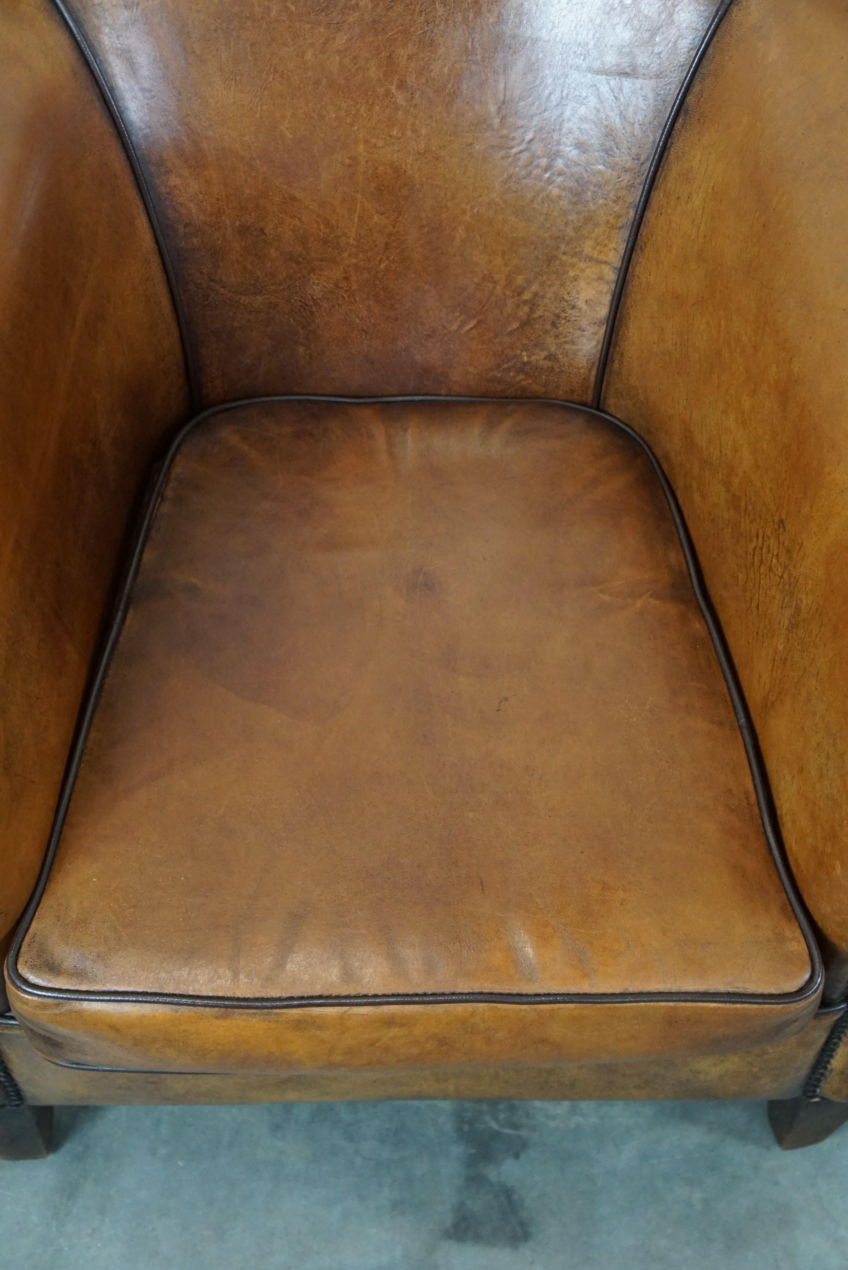Late 20th Century Set of 2 amazing and characterful sheep leather club armchairs with warm color For Sale