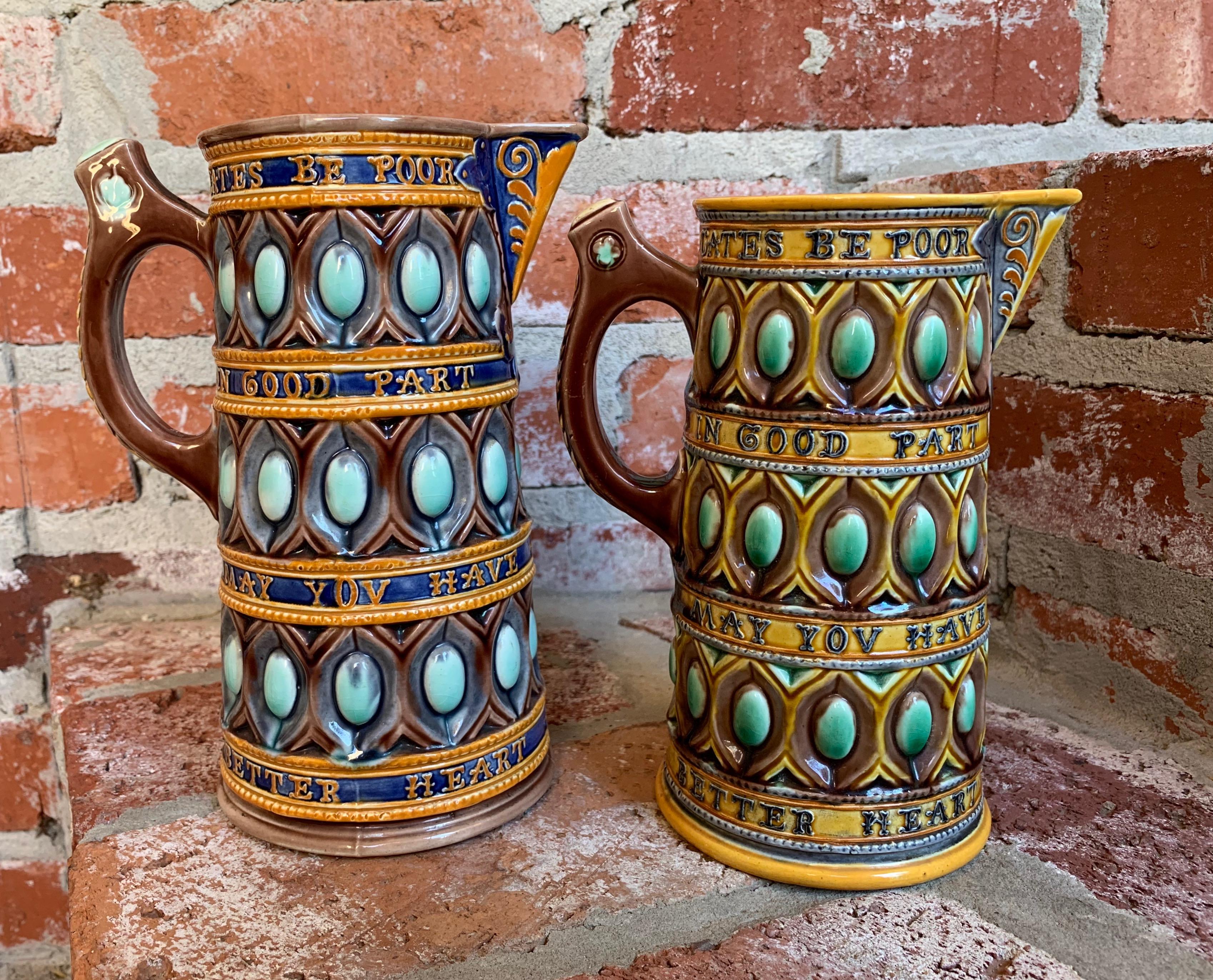 ~Direct from England~
~Amazing that here we have two of these unique and rare Wedgwood pitchers or “caterer jugs” for sale!~ 
~The body of the jugs are heavily relief moulded with bands of repeat design set between moulded belts of written