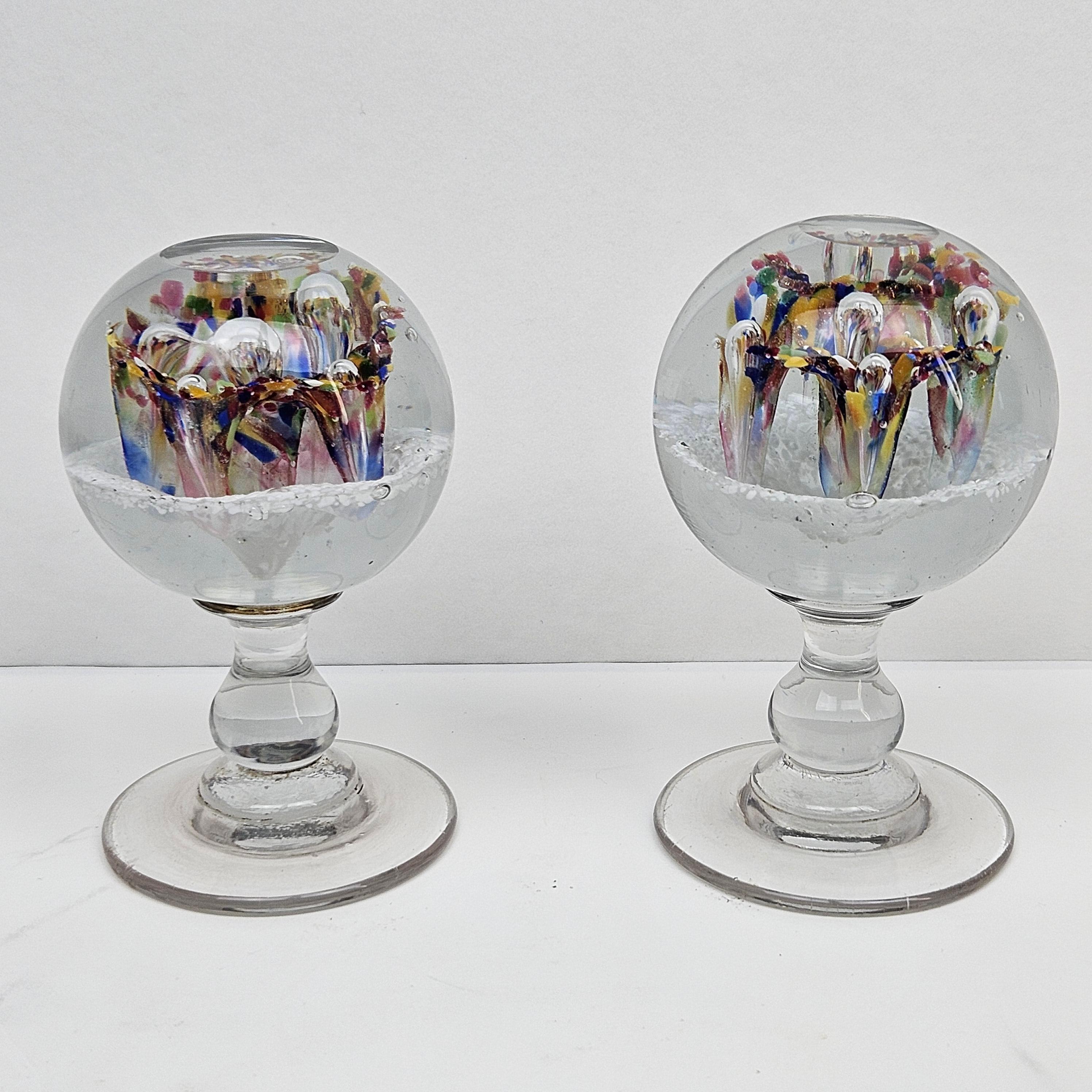 Very beautiful set of 2 glass paperweights.
This set is made in Belgium in the 19th century.

They were also used as a hat or hairpiece pedestal.
Now they are used for decoration.

These paperweights are hand blown by Belgium craftsmen in the glass