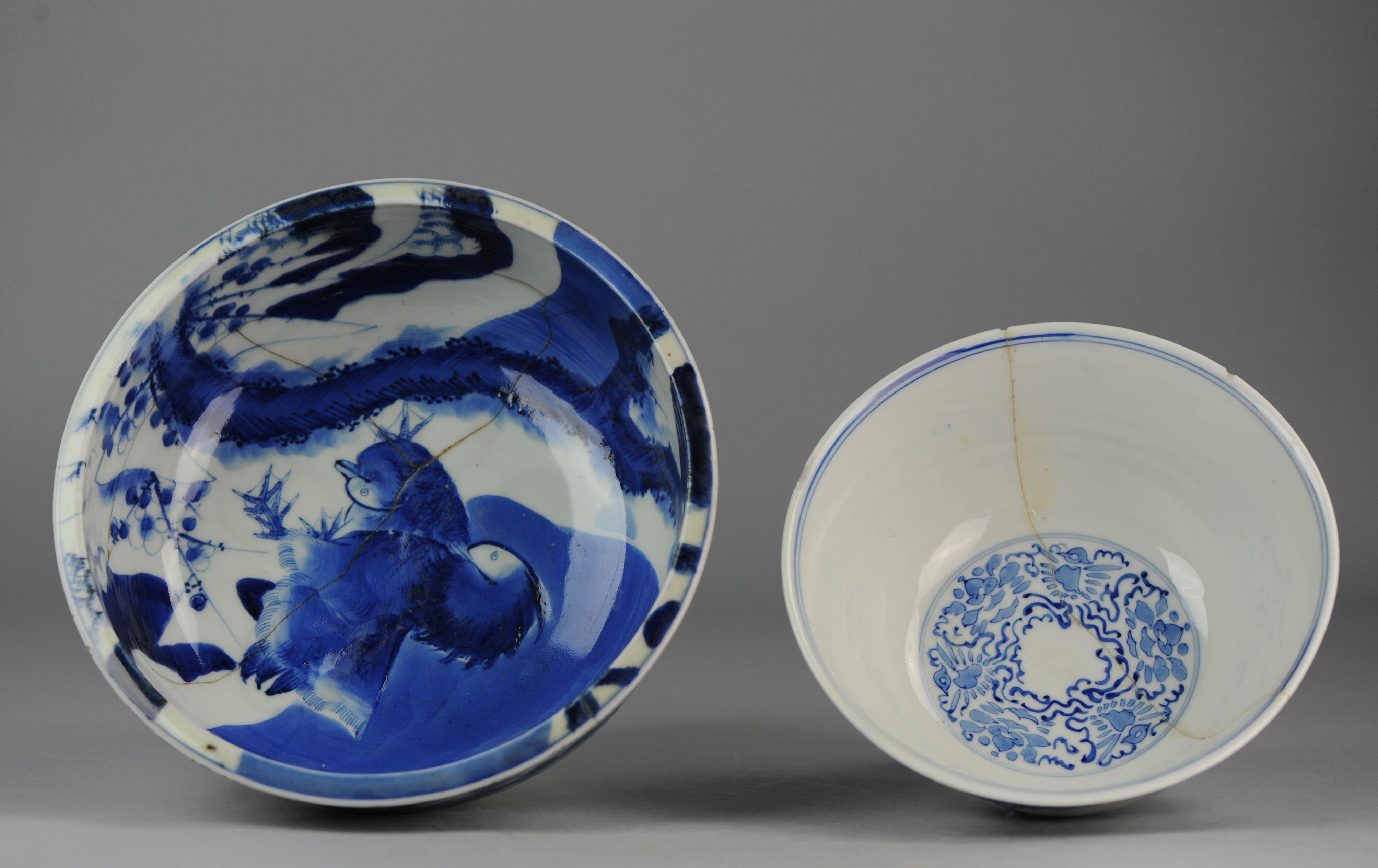 Lovely Set of 2 Japanese porcelain bowls/Basins.

Additional information:
Material: Porcelain & Pottery
Type: Basins (Washing & Fish Bowls & Planters), Bowls
Color: Blue & White
Region of Origin: Japan
Period: 19th century
Age: 19th