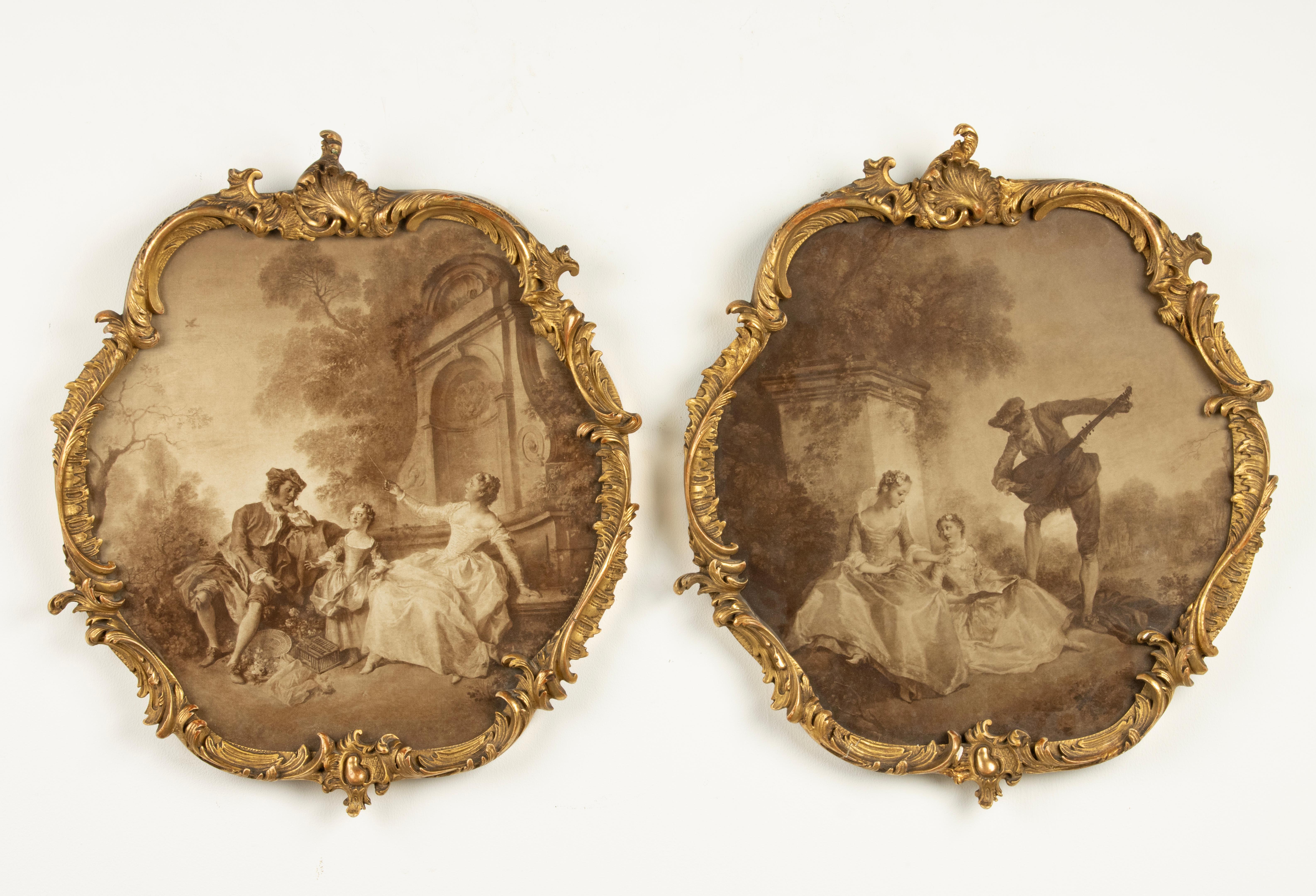 A beautiful set of two antique French prints, with romantic scenes, framed (behind glass) in antique gilded frames.
The prints are executed in sepia, a range of brown tones.
The frames are made of wood, covered with plaster (gesso), gilded with gold