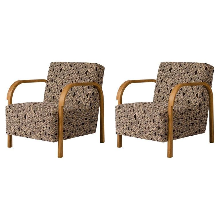 Set Of 2 ARCH JENNIFER SHORTO / Kongaline & Seafoam Lounge Chairs by Mazo Design
Dimensions: W 69 x D 79 x H 76 cm
Materials: Oak, Textile

With the new ARCH collection, mazo forges new paths with their forward-looking modernism. The series is a