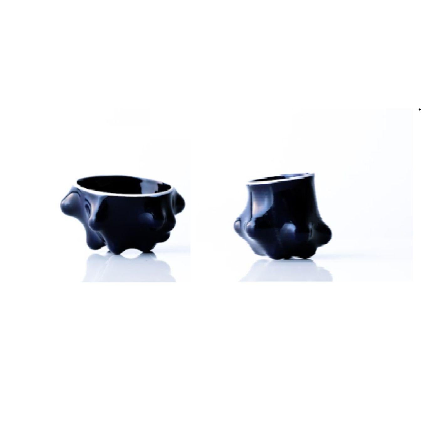 Set of 2 Arkadiusz Szwed Bumps 2.0 Bowl Cup by Nów
Designed by Arkadiusz Szwed
Dimensions: D 18 x W 18 x H 10 cm
Materials: glazed porcelain, cobalt

BUMPS 2.0 is a set of ceramic objects that were created as a result of an experiment with a