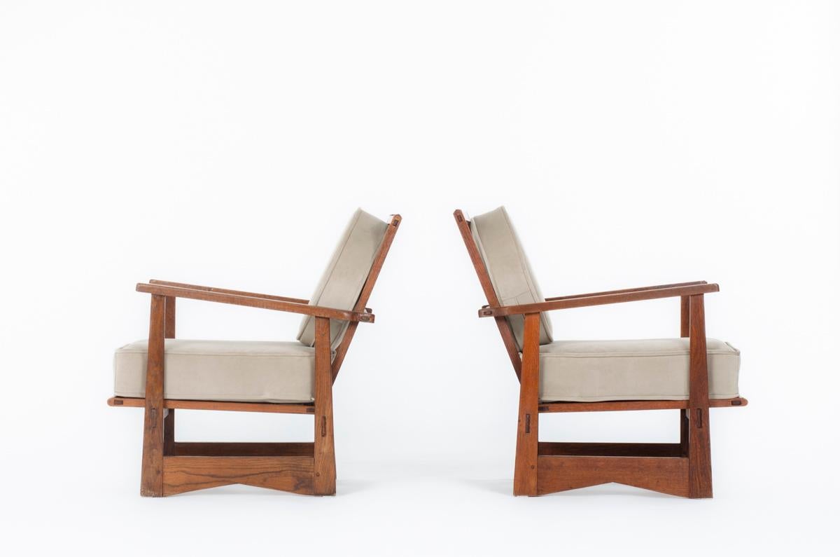 Set of 2 armchairs from mid-century in France, reconstruction period
Structure in patinated oak with armrests and backrest, foam cushions for the seat, and back covered by brown velvet fabric
Chic lines