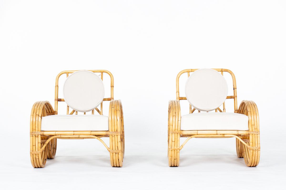 Ensemble de 2 fauteuils fabriqués en France dans les années 50
Structure en rotin, assise avec coussins de dossier en mousse recouverts d'un tissu en velours beige (neuf)
Beau modèle