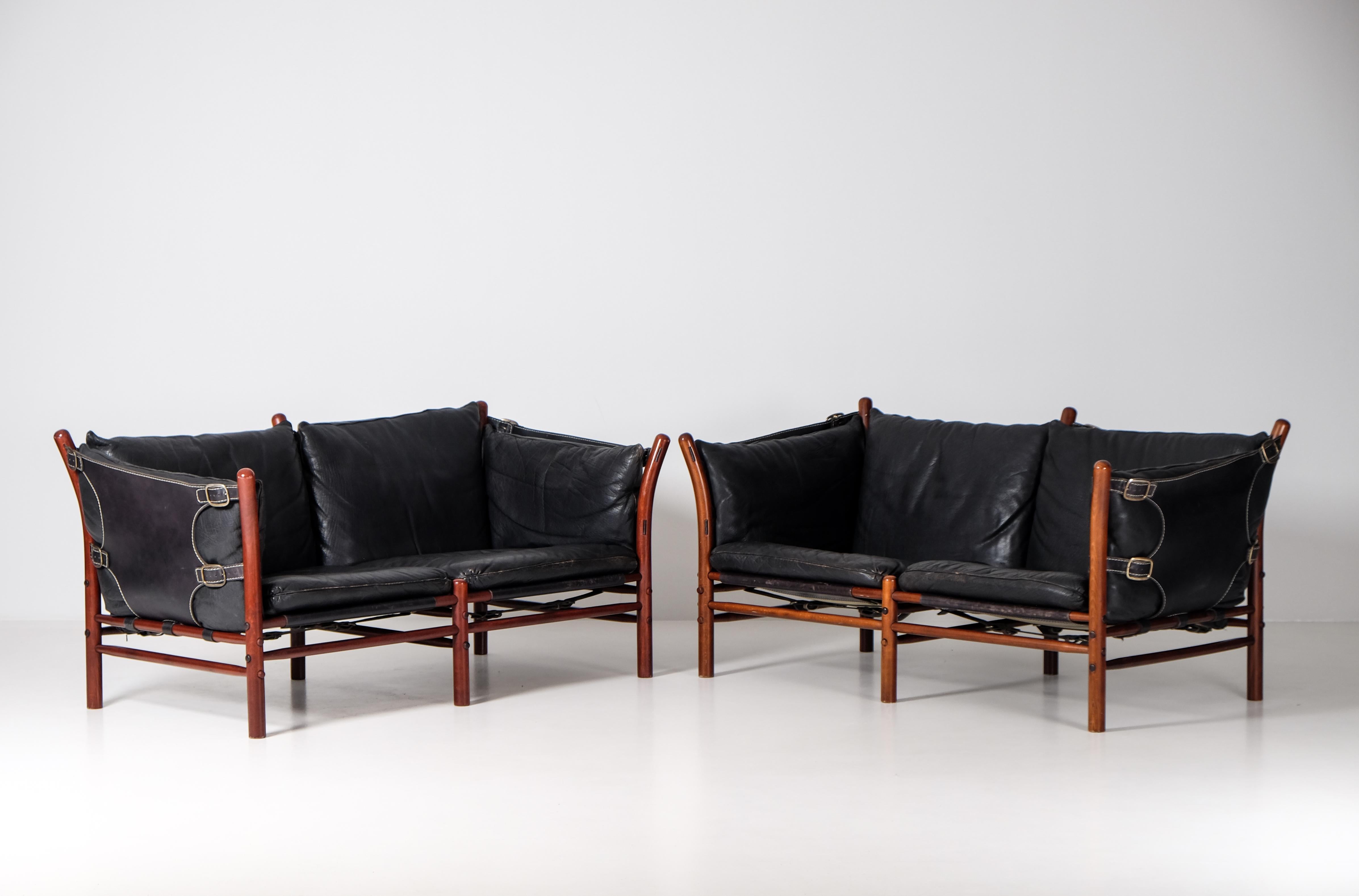 Pair of ilona sofas designed by Arne Norell 1960s, produced by Norell Möbel AB, Sweden.
Dark stained beech, original black leather and brass details.
Please note: Listed price is for (1) one sofa.
Global front door shipping, delivery within 14