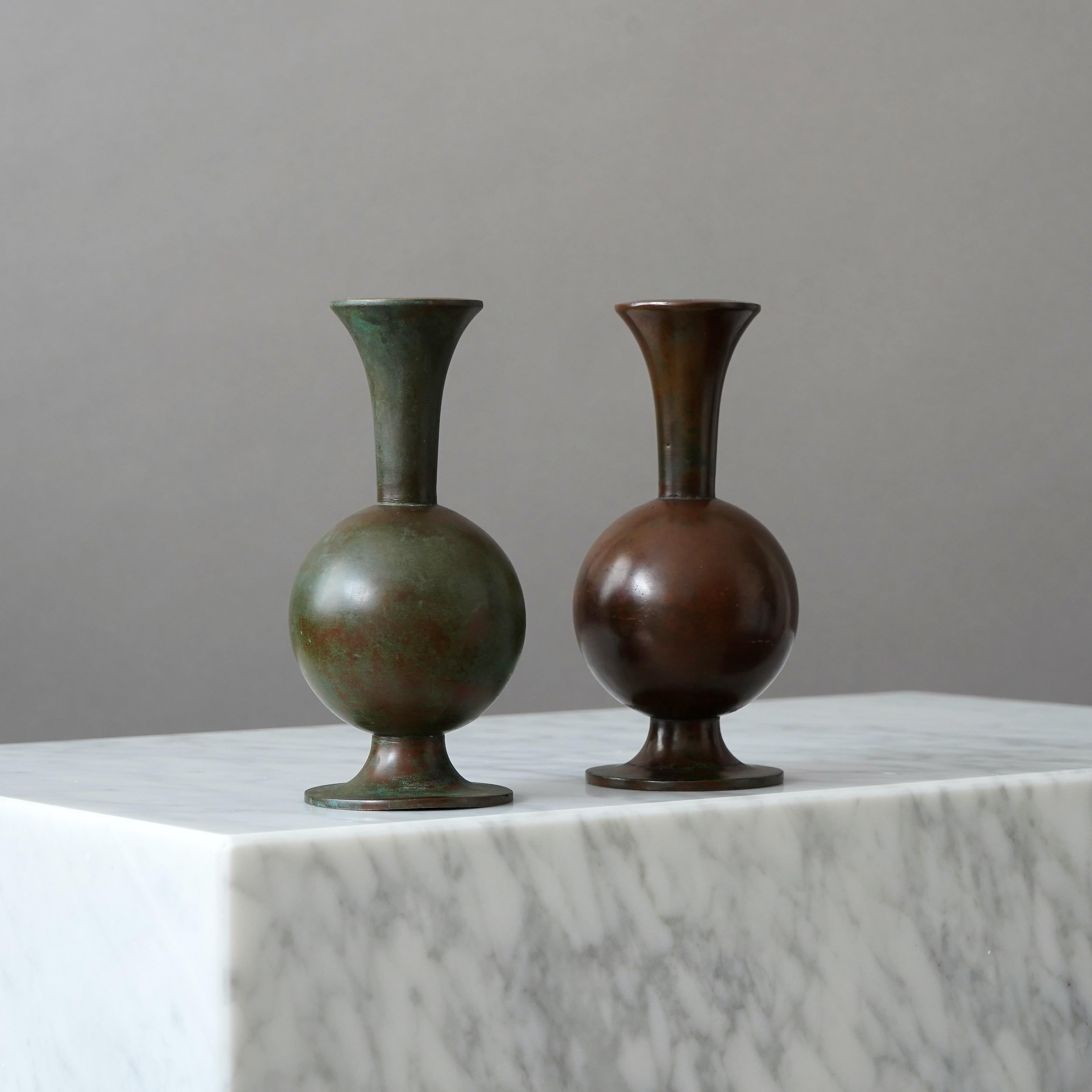 A set of beautiful bronze vases with amazing patina. Designed by Sune Bäckström in Malmoe, Sweden, 1920s.  

Great condition. The colors differ slightly.
Stamped 'BRONS', model number '9020' and signature 'Sune Bäckström'.

Produced by Einar