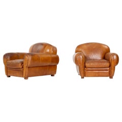 Set of 2 Art Deco design brown leather club armchairs