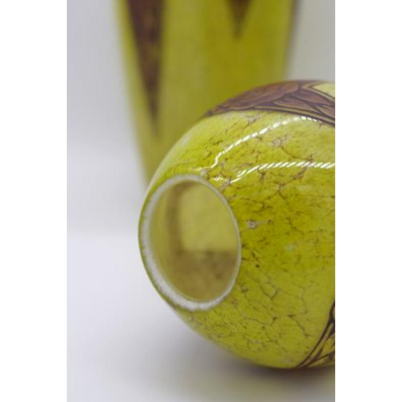 Set of 2 Art Deco Ovoid Vases by F-T Legras, 1920s

Vintage Design
Pair of ovoid vase signed François-Théodore Legras. (1839 - 1916) in marbly yellow marbled glass paste Decor with art deco geometric patterns, in the shape of a lined glass amphora